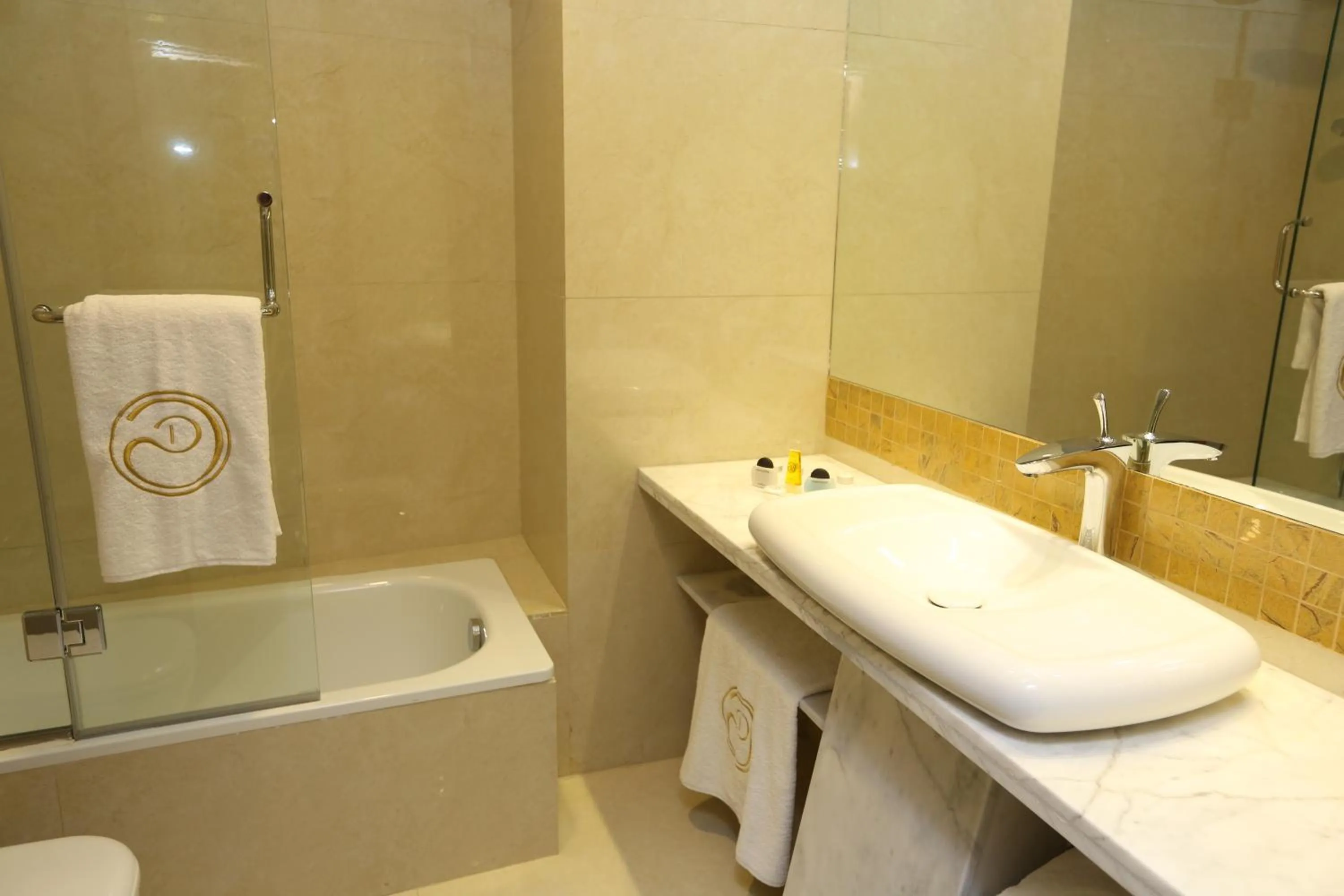 Bathroom in Delora Hotel and Suites