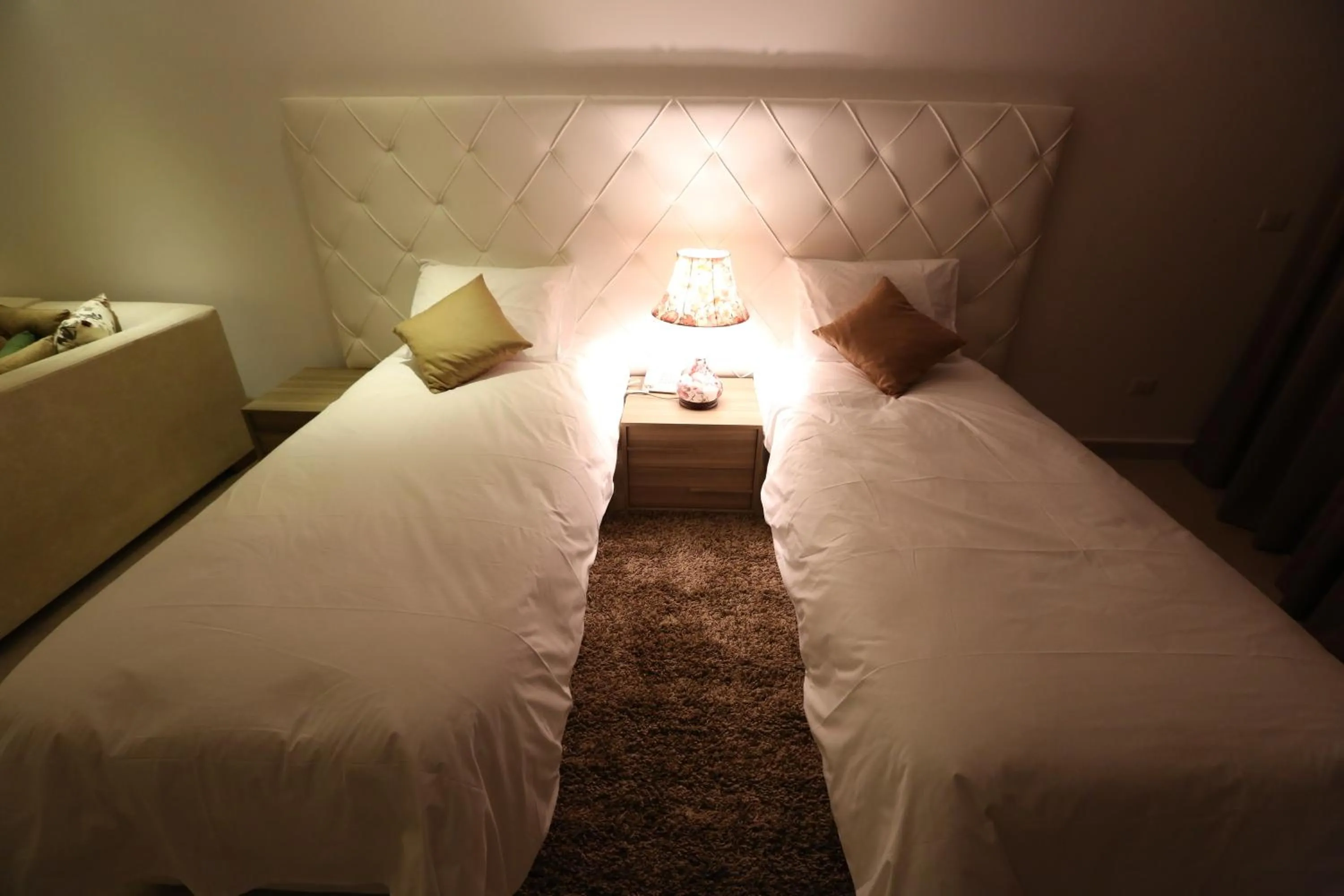 Bed in Delora Hotel and Suites