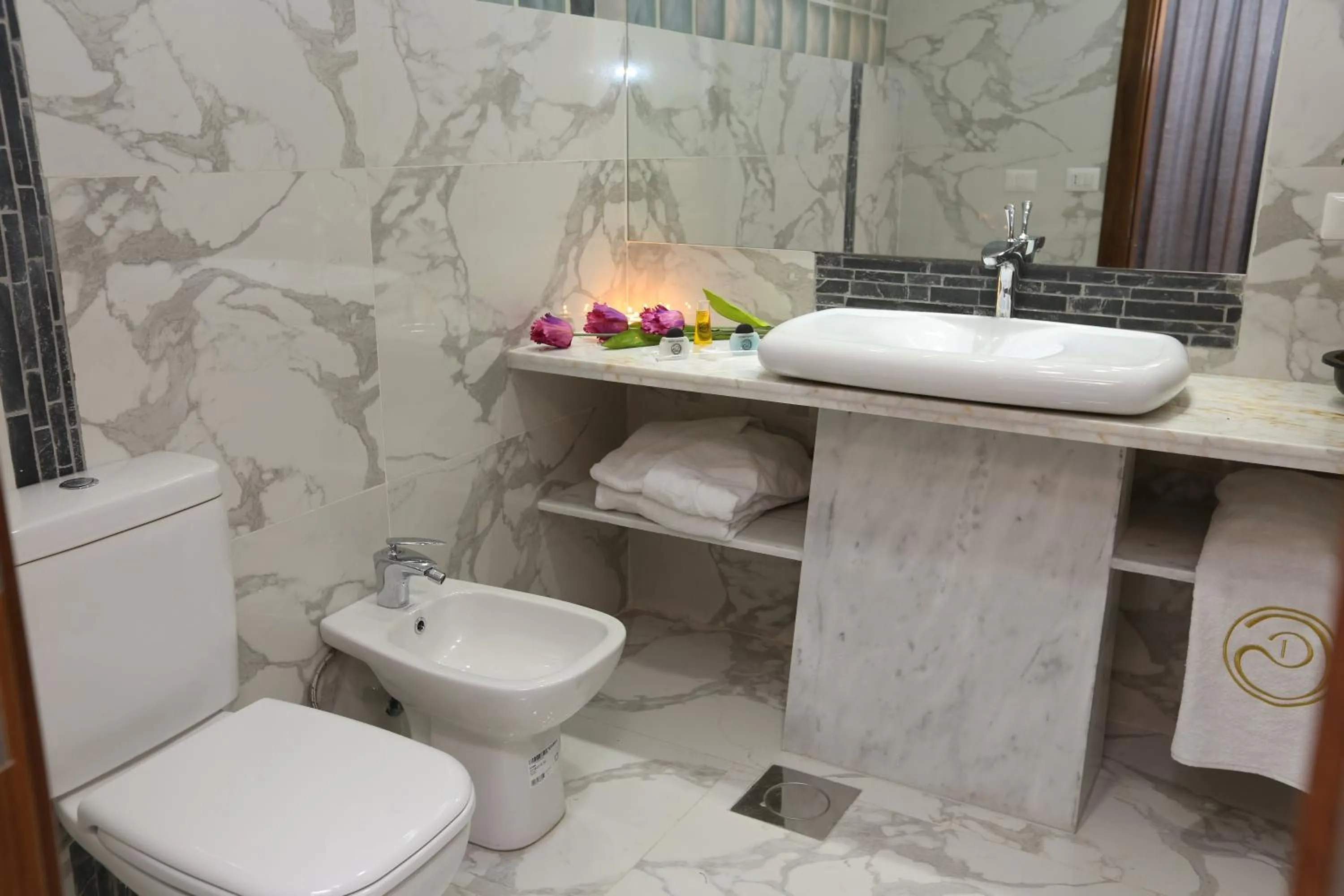 Bathroom in Delora Hotel and Suites