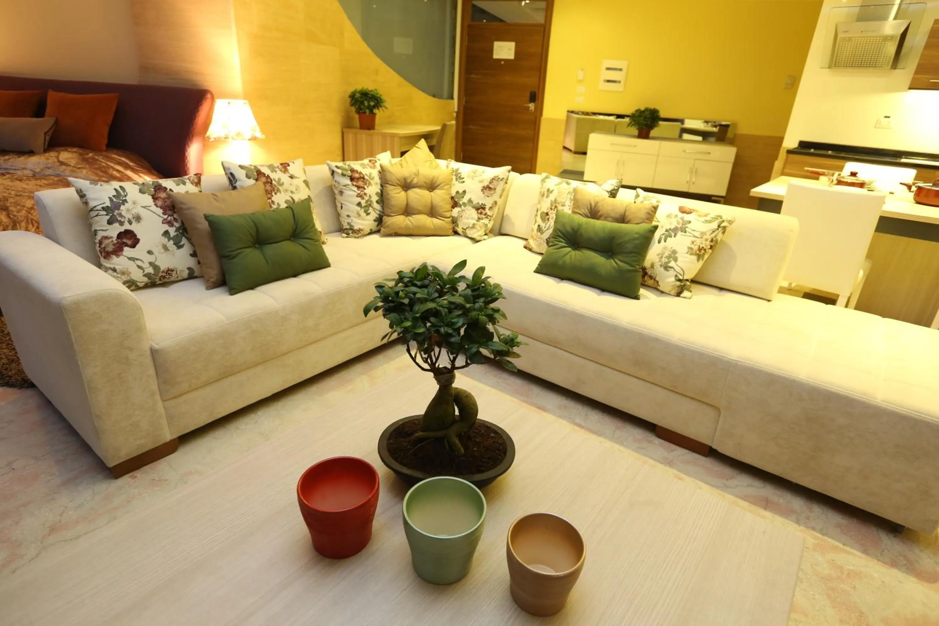 Living room, Bed in Delora Hotel and Suites