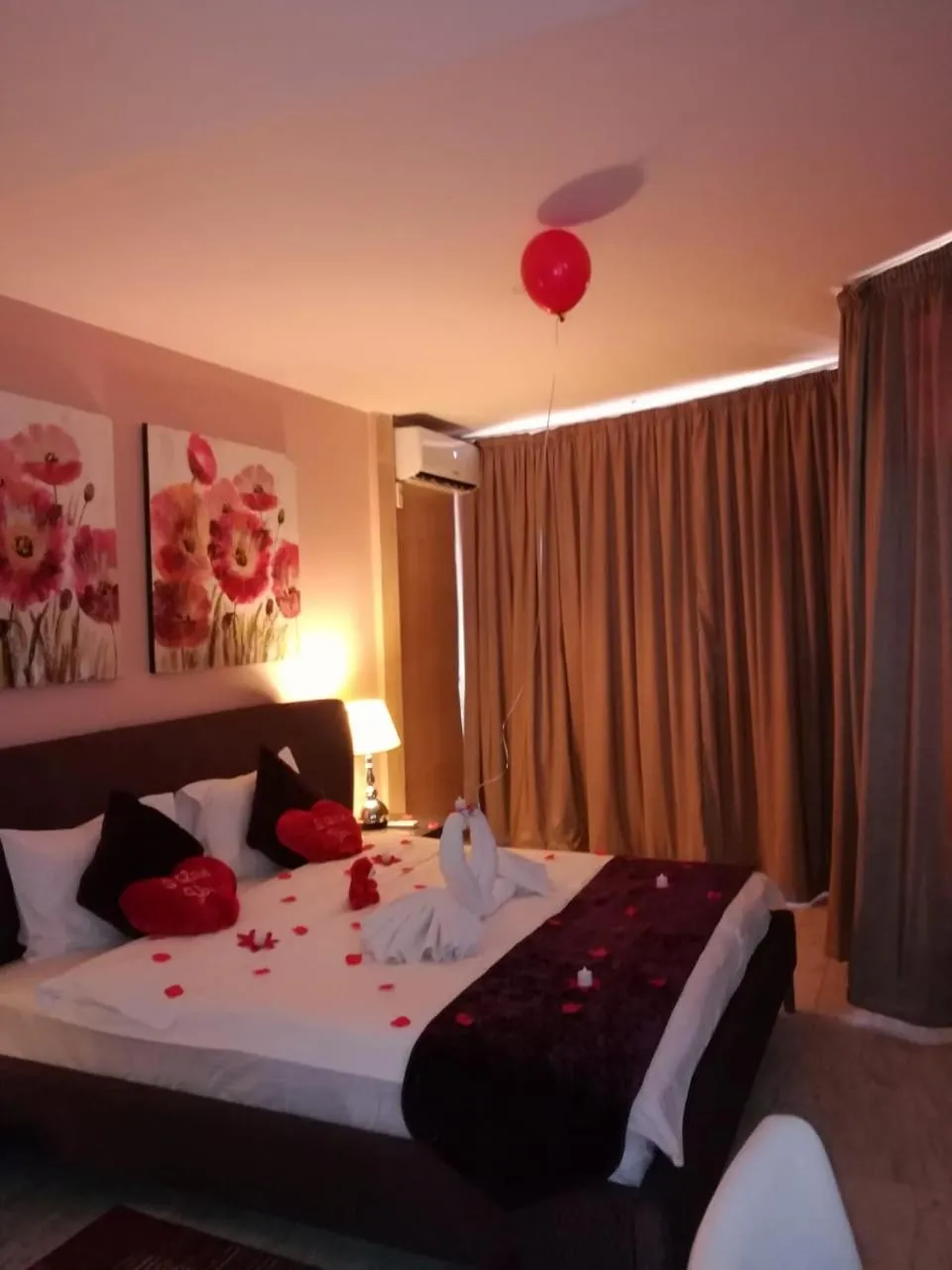 Bed in Delora Hotel and Suites