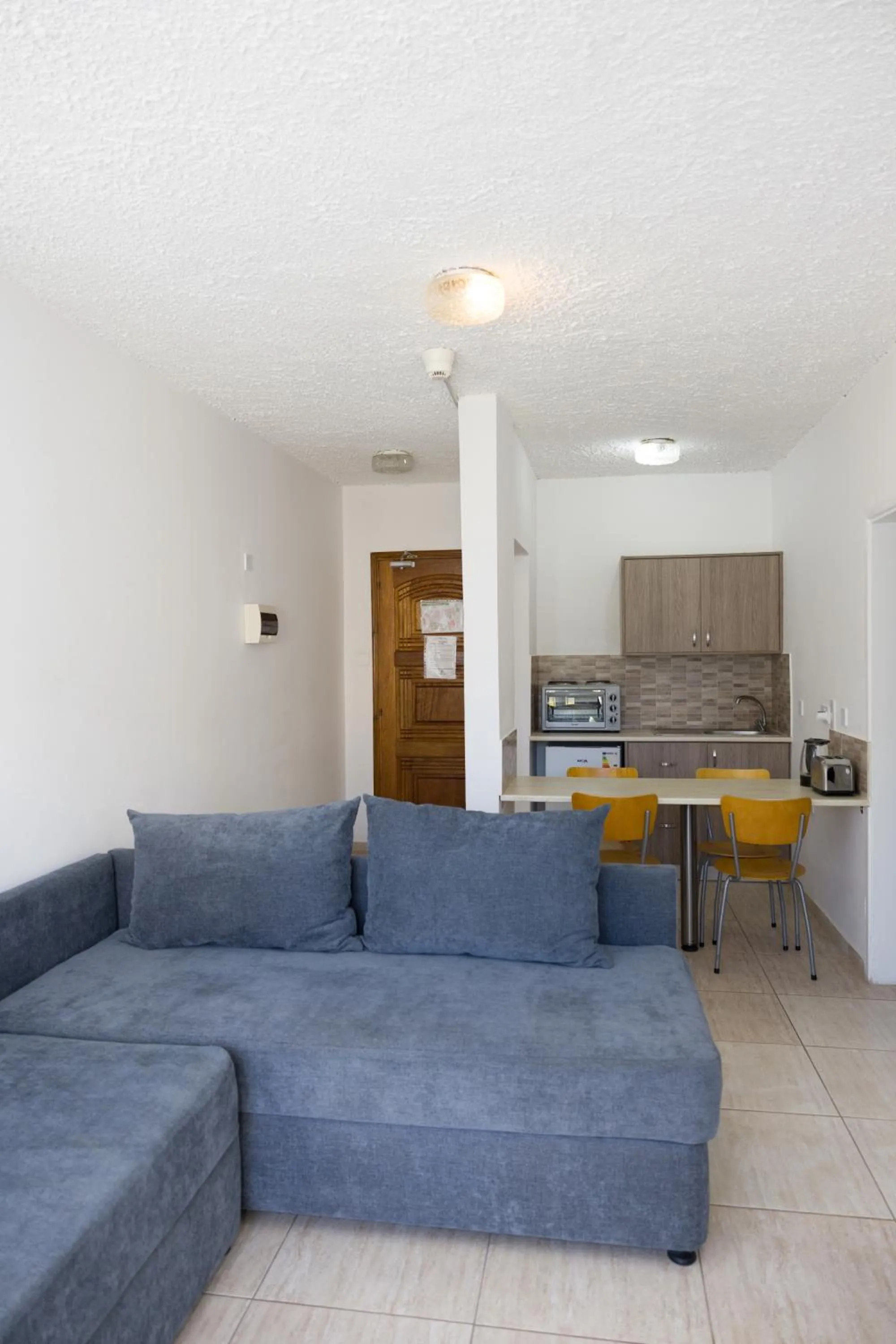 Seating area in Alecos Hotel Apartments