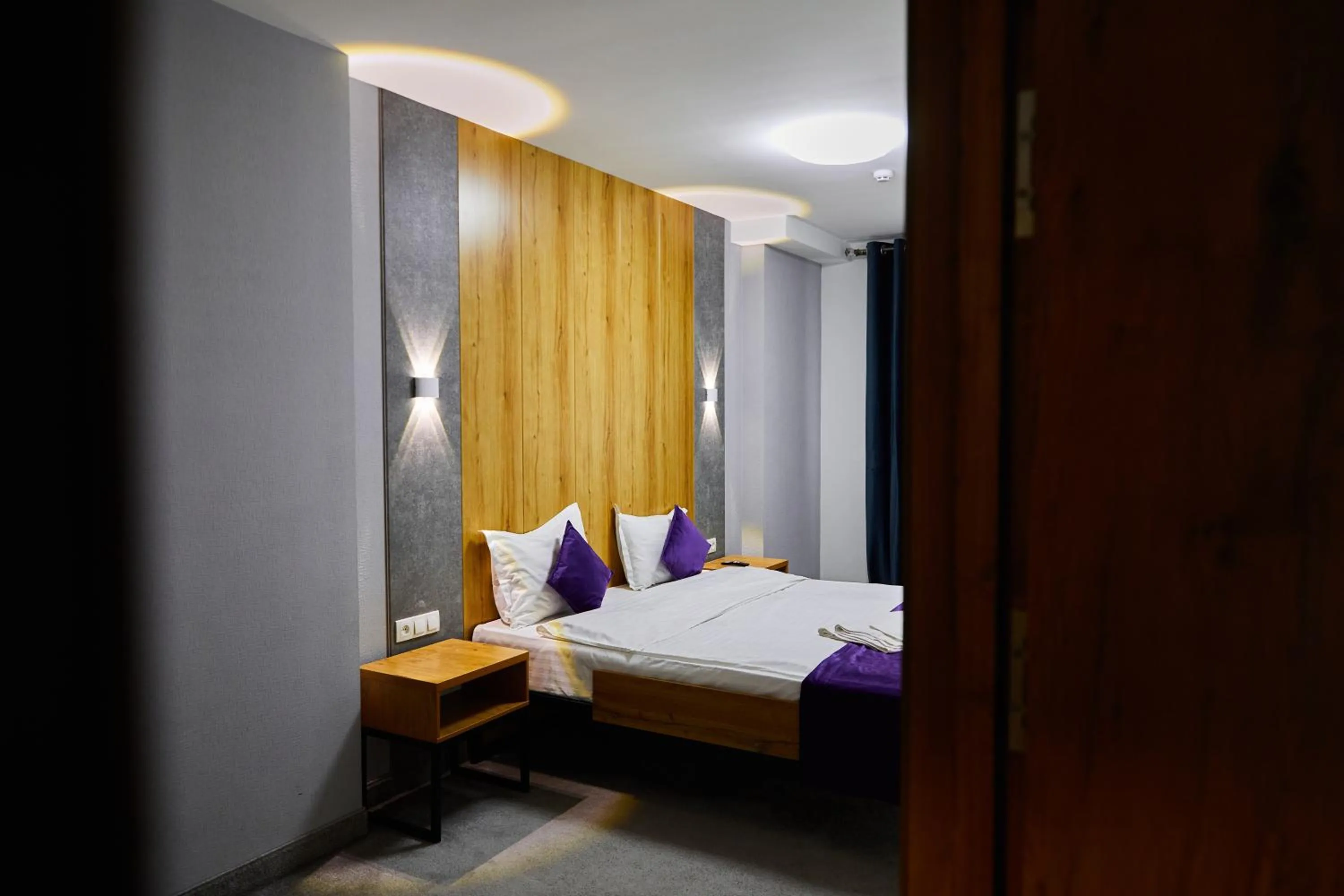 Bed in Art Plaza Hotel