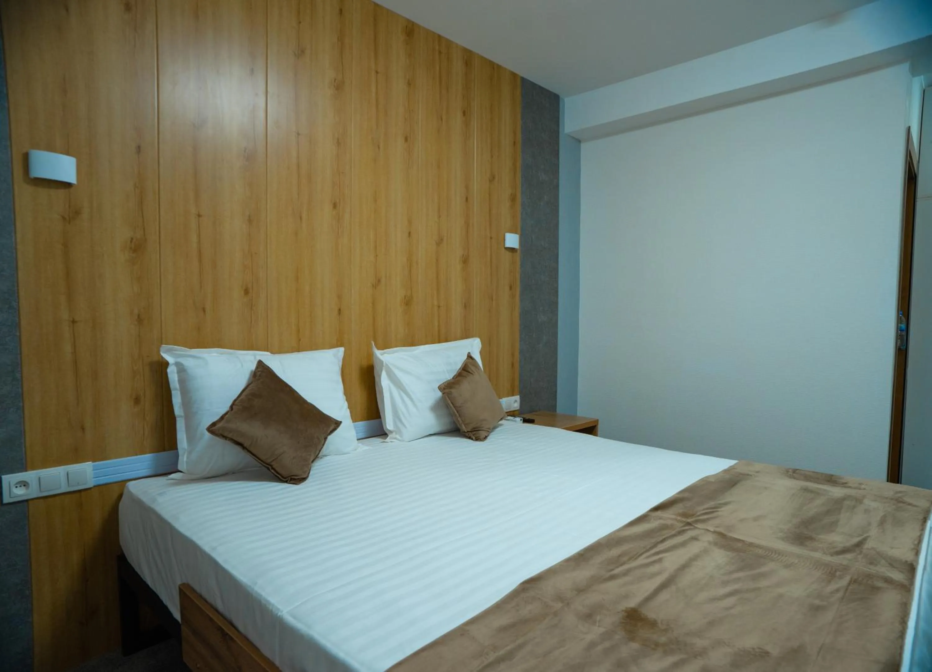 Bed in Art Plaza Hotel