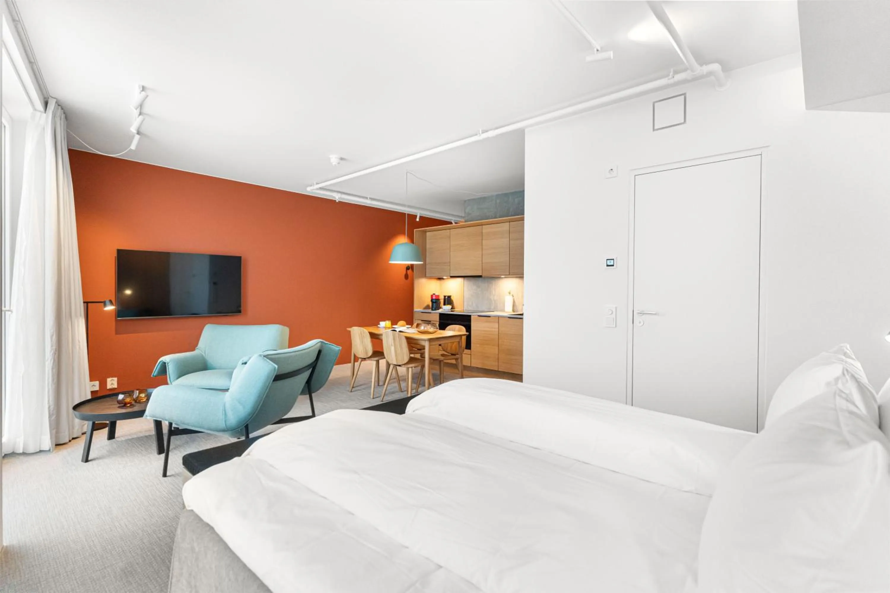 Seating area, Bed in LUX Hotel Apartments Lillestrøm