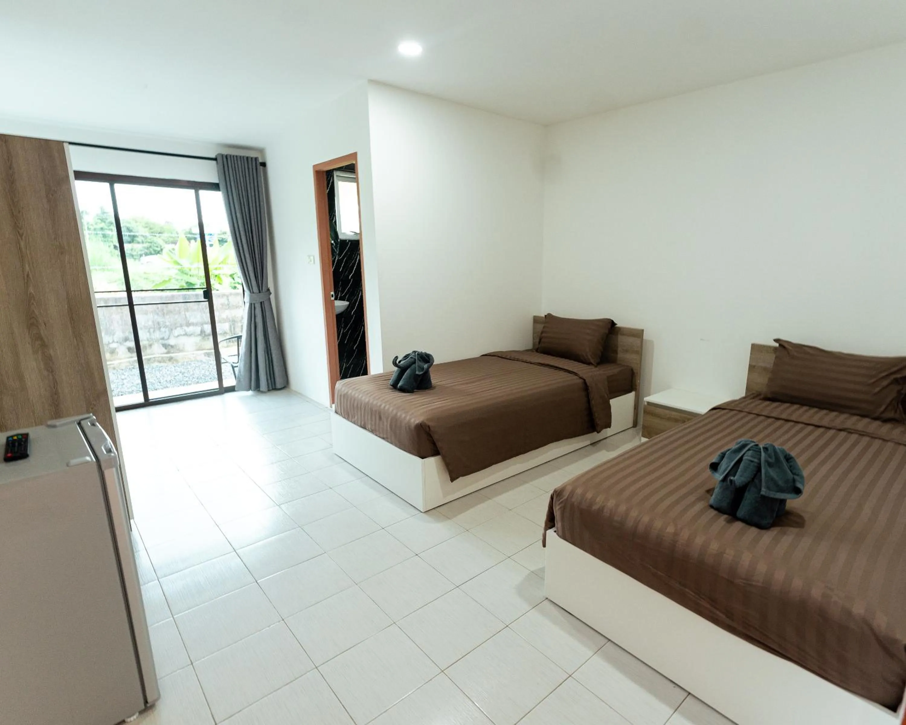 Bed in Apollo Hotel Chalong