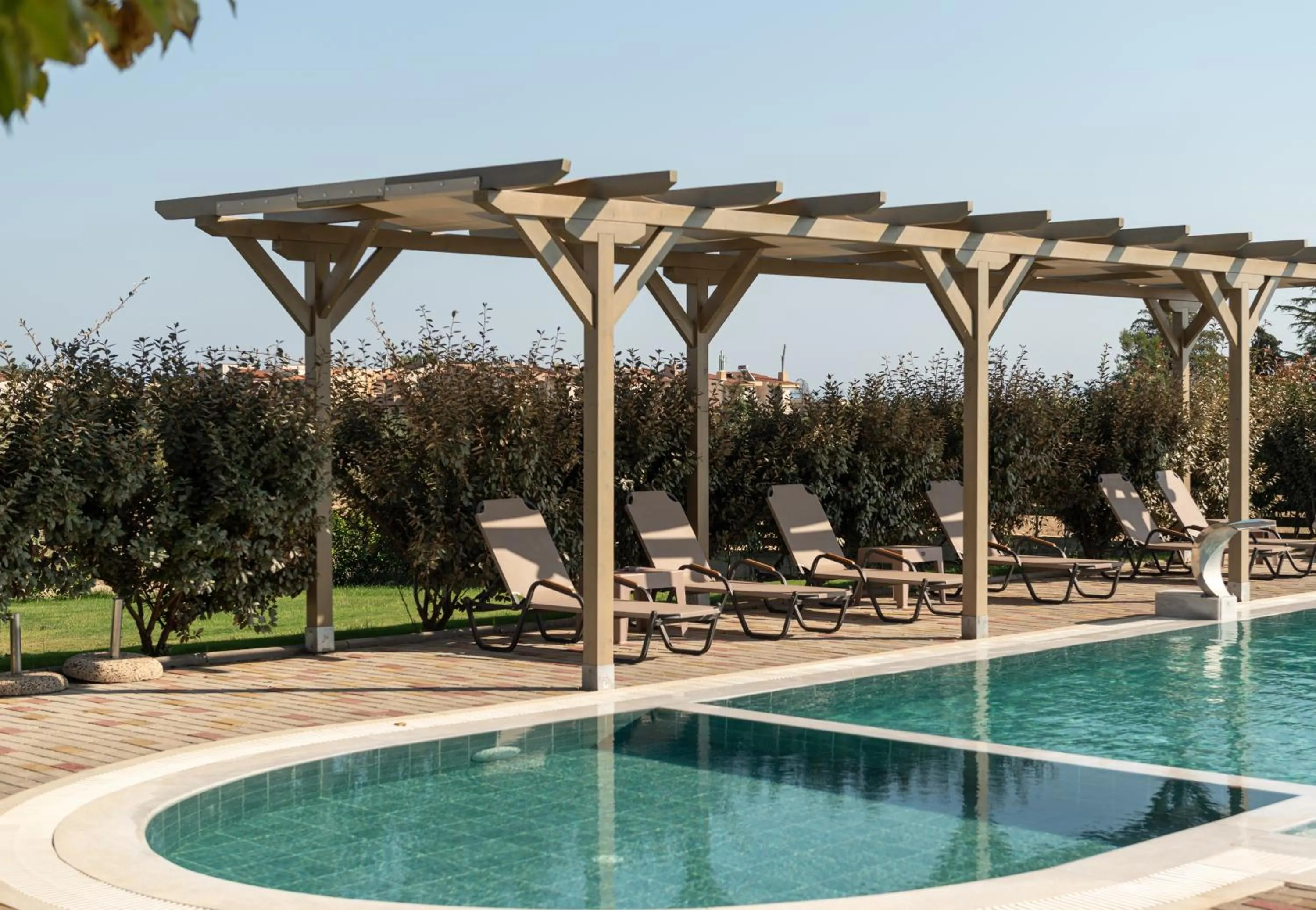 Swimming pool in Aetherion Studios & Suites