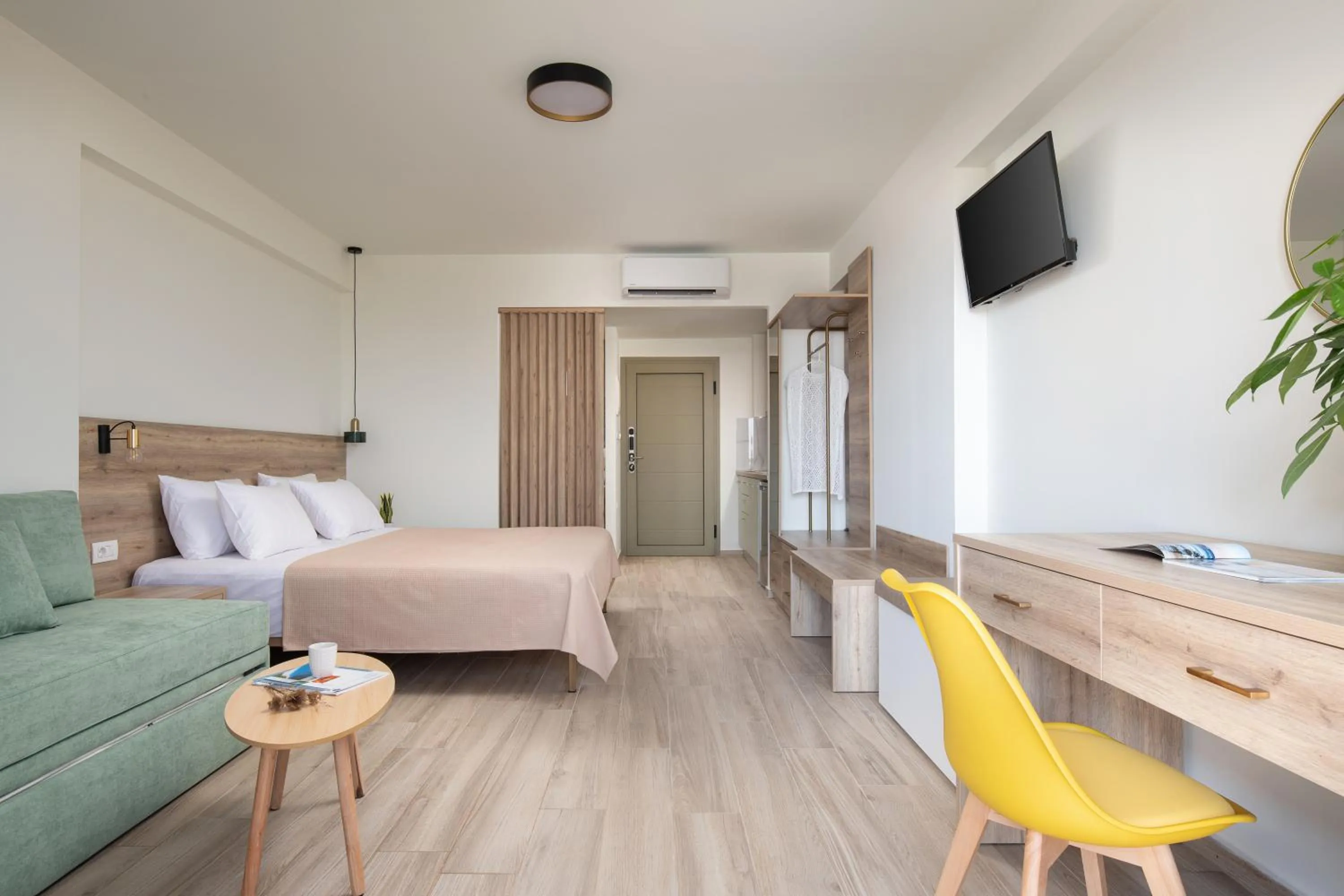 Bed in Aetherion Studios & Suites