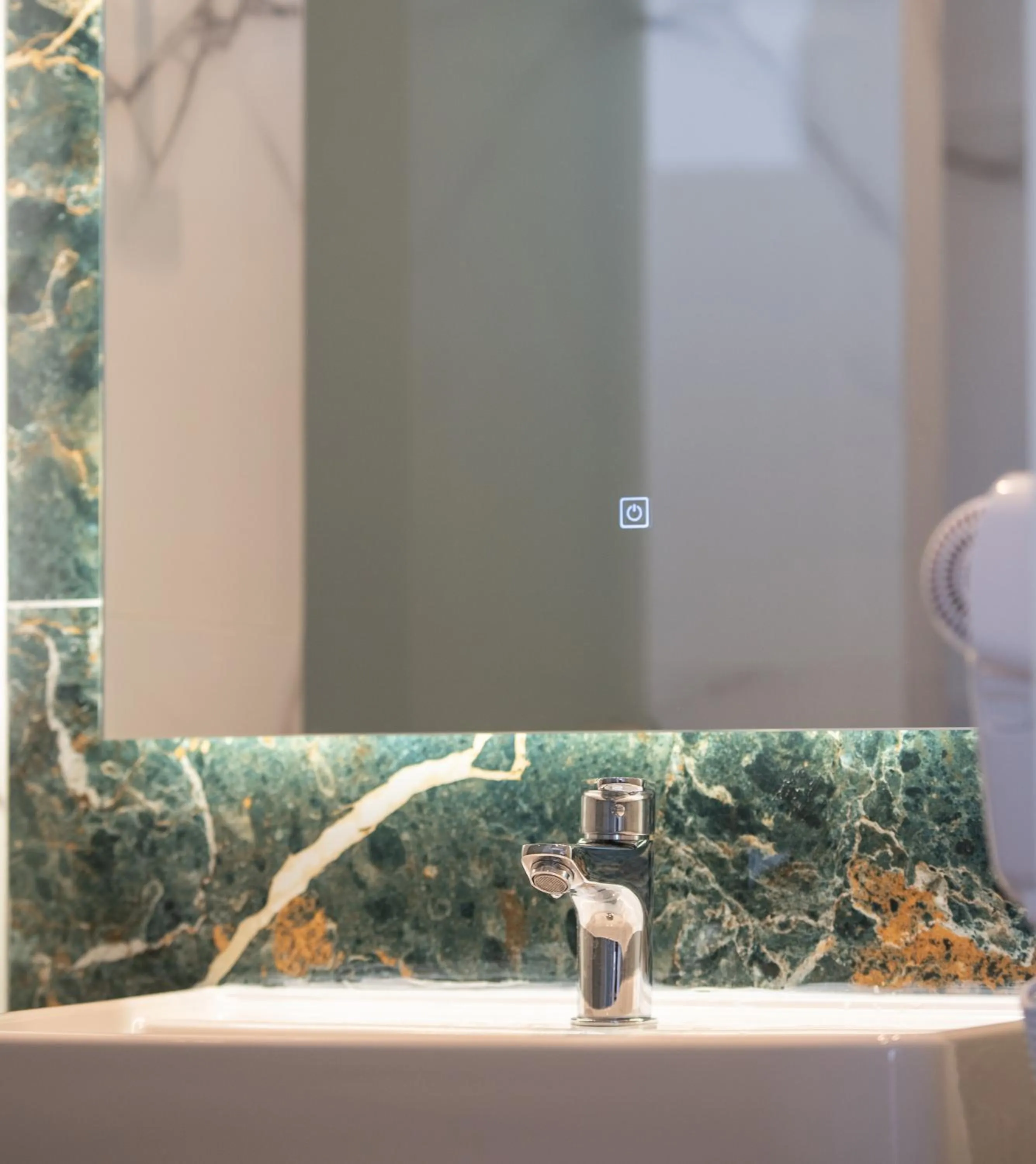 Bathroom in Aetherion Studios & Suites