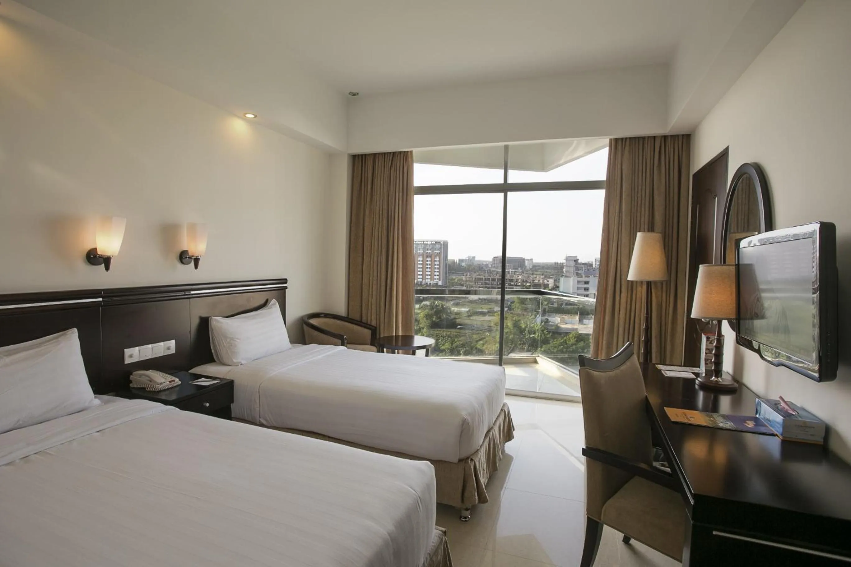 Bed in Ocean Paradise Hotel and Resort