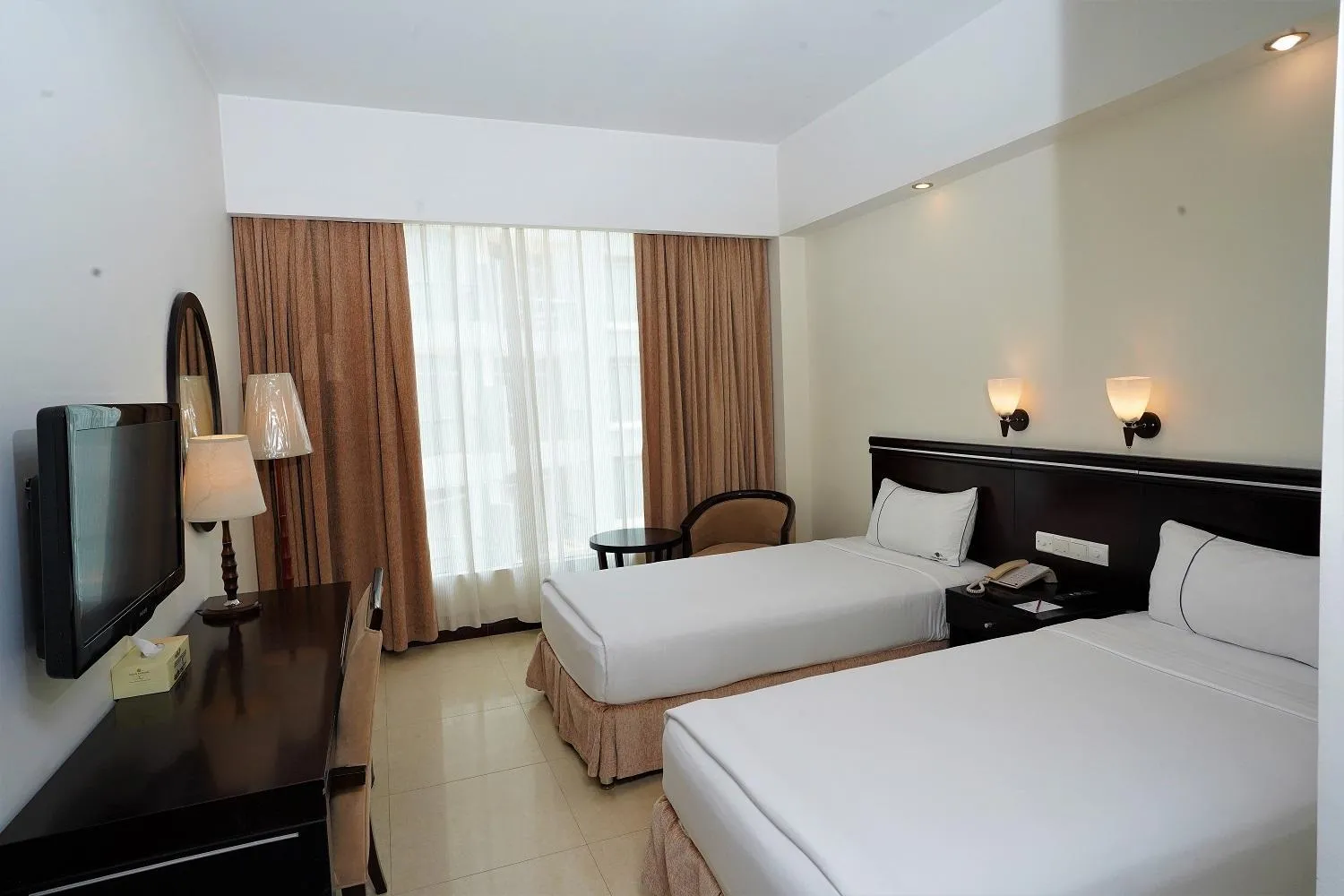 Bed in Ocean Paradise Hotel and Resort