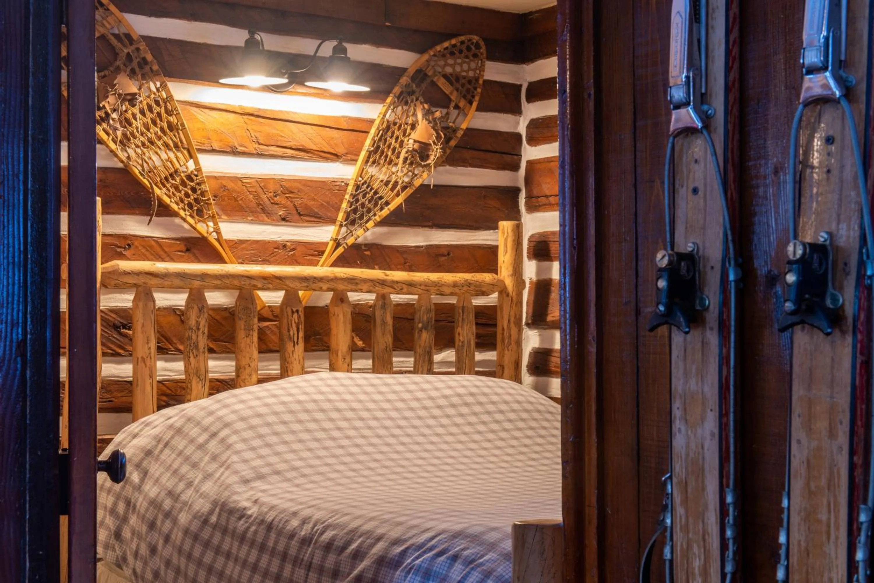 Bed in Pioneer Guest Cabins