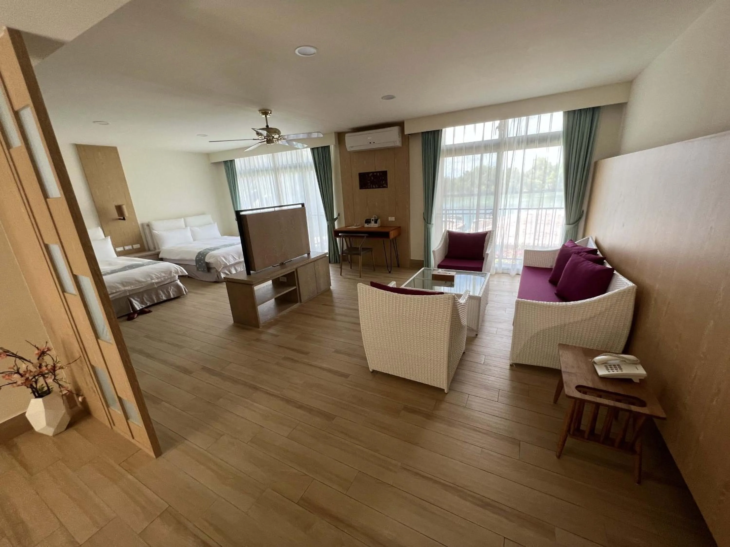 Living room, Bed in Sea Passion Hotel