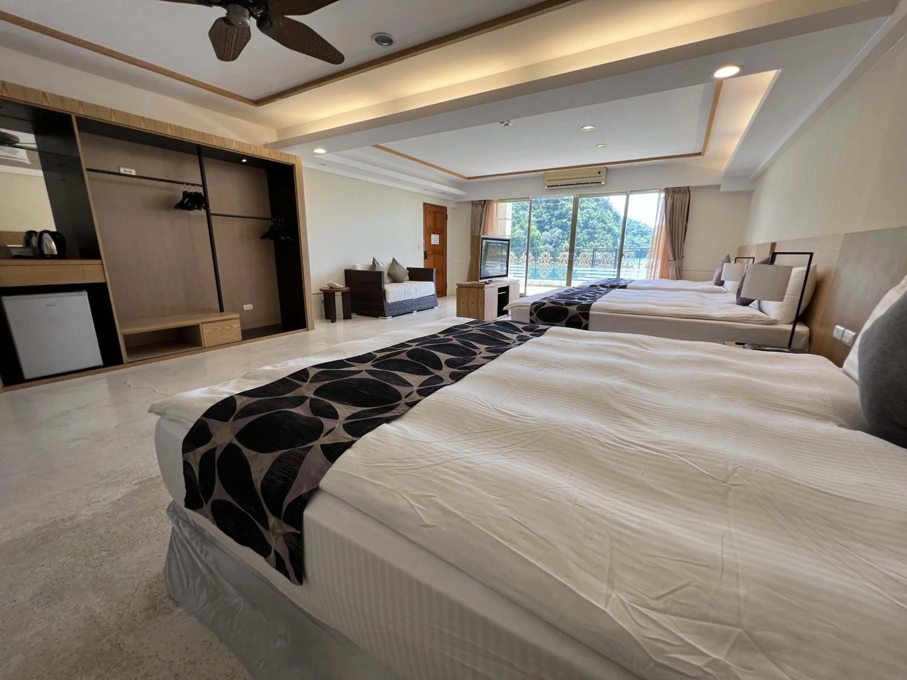 Photo of the whole room, Bed in Sea Passion Hotel