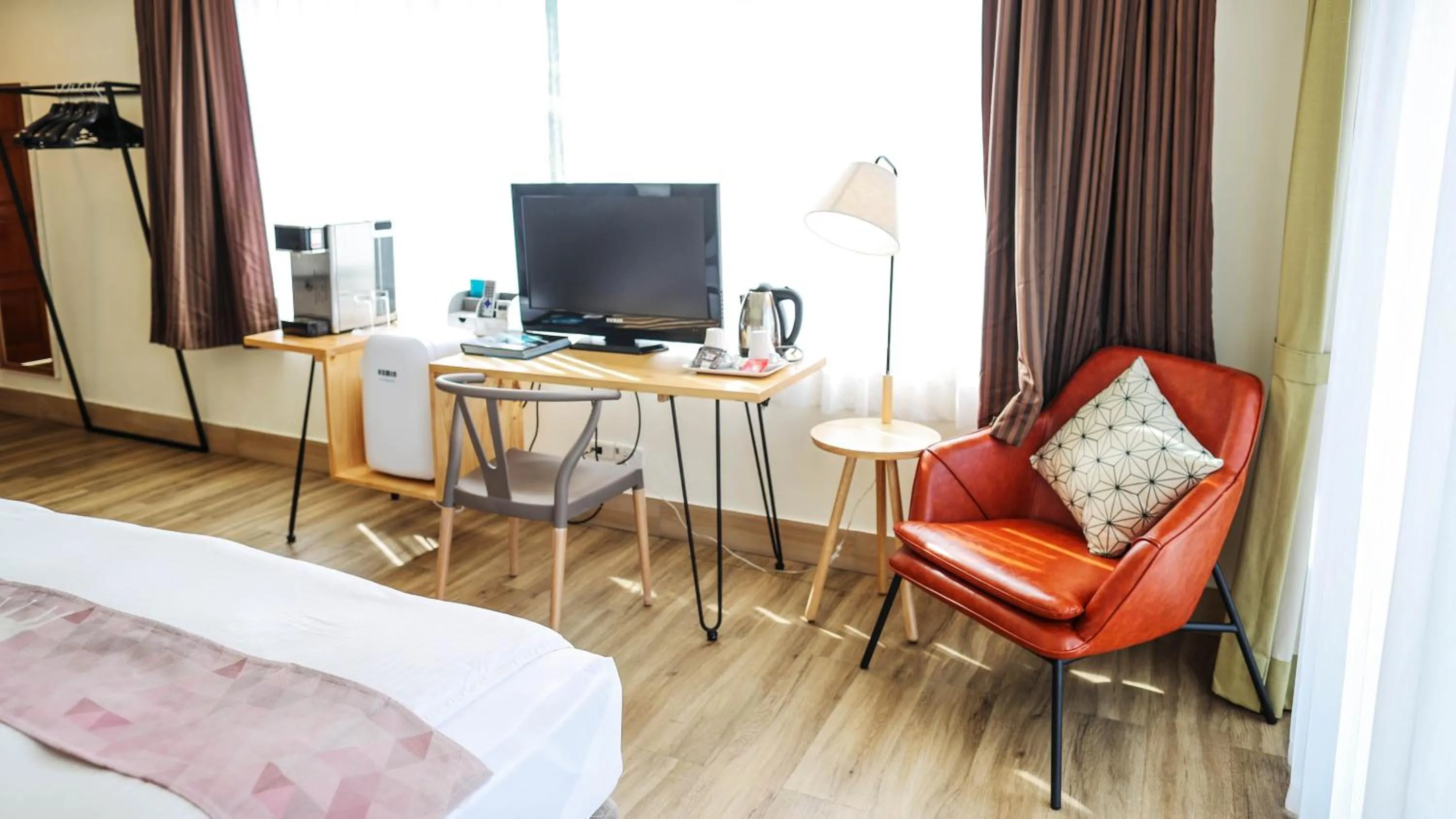 Living room, Bed in Sea Passion Hotel