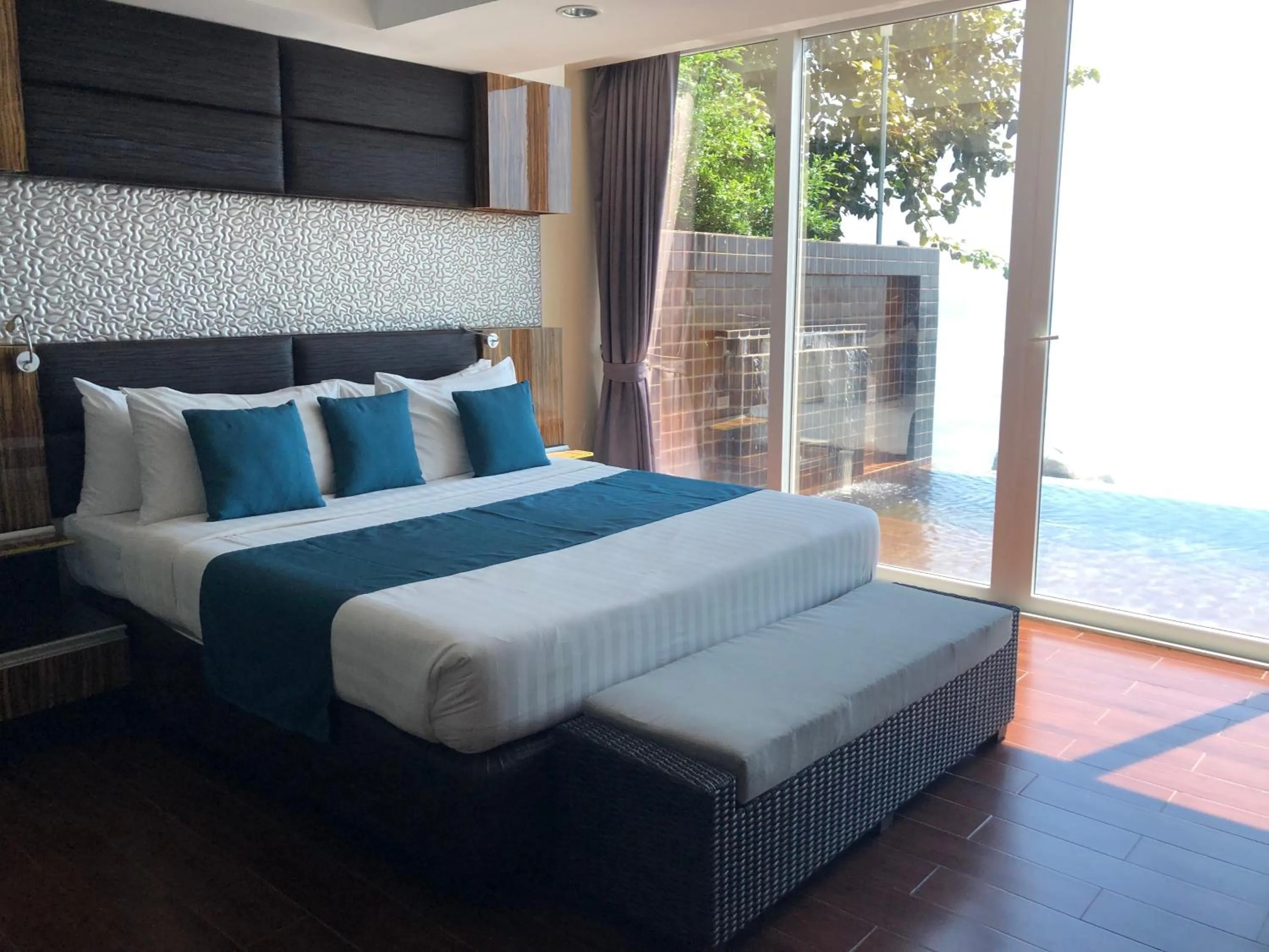 Bed in Royal Beach Boutique Resort & Spa Koh Samui