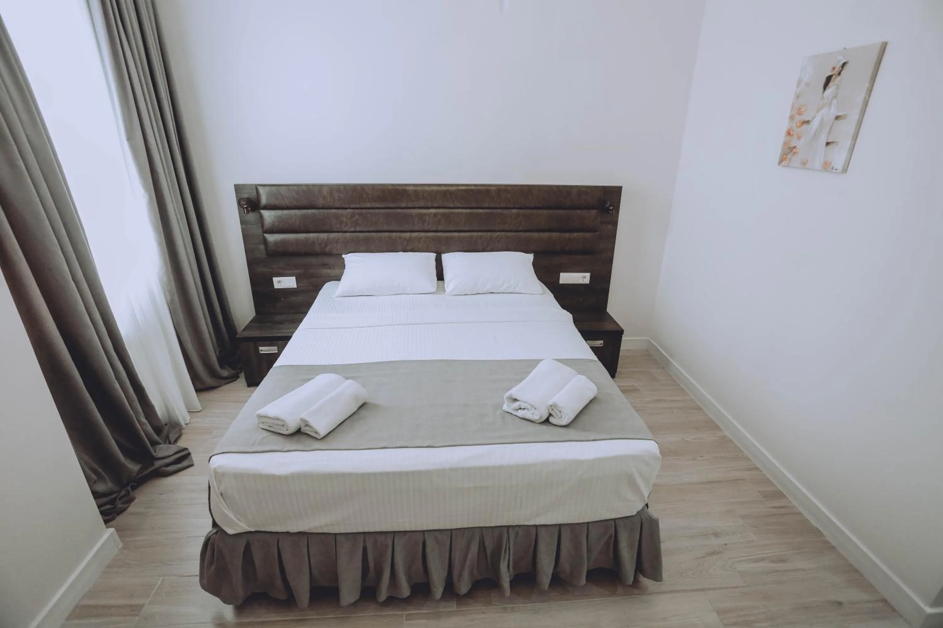 Bed in Royal Medis Hotel