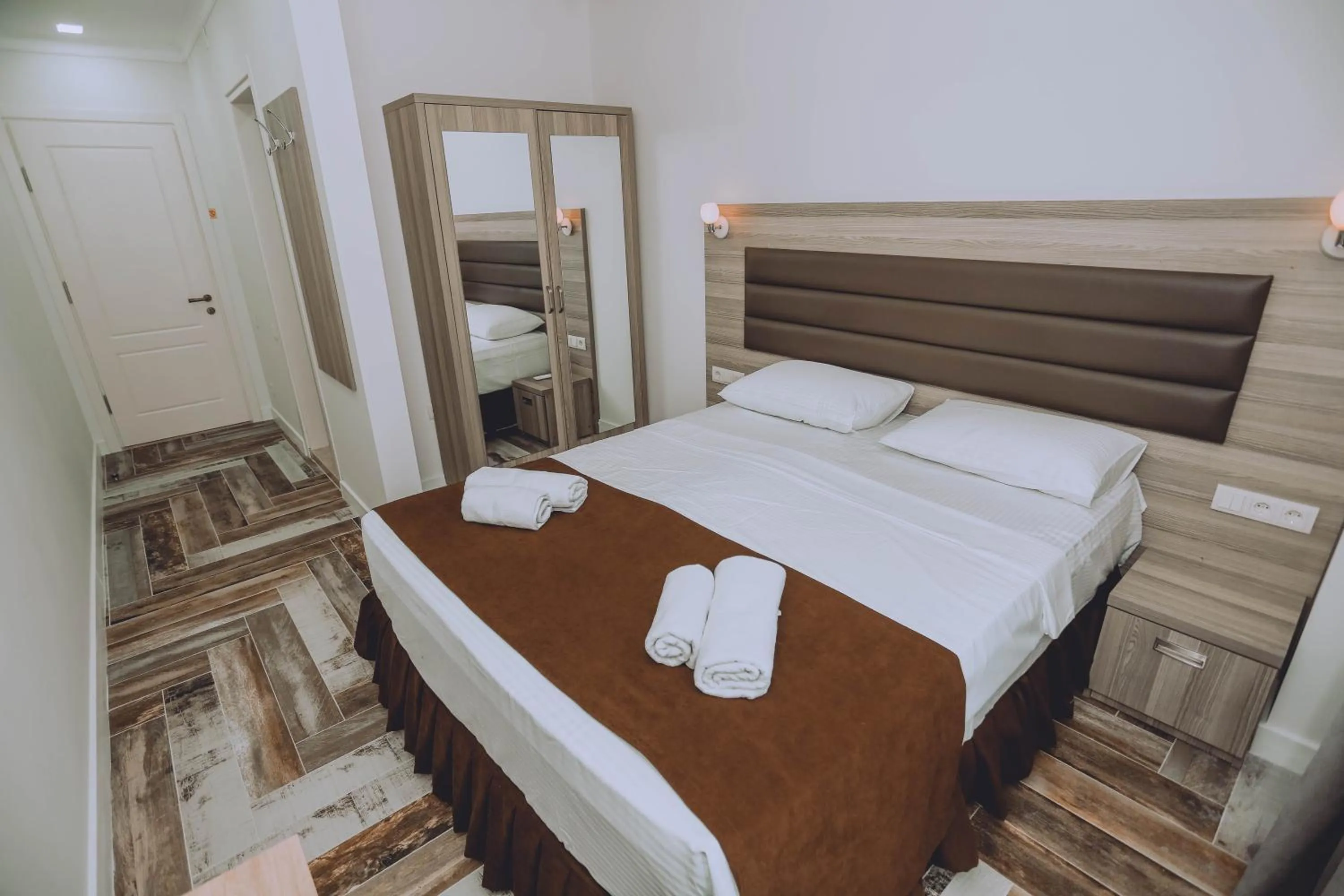 Bed in Royal Medis Hotel