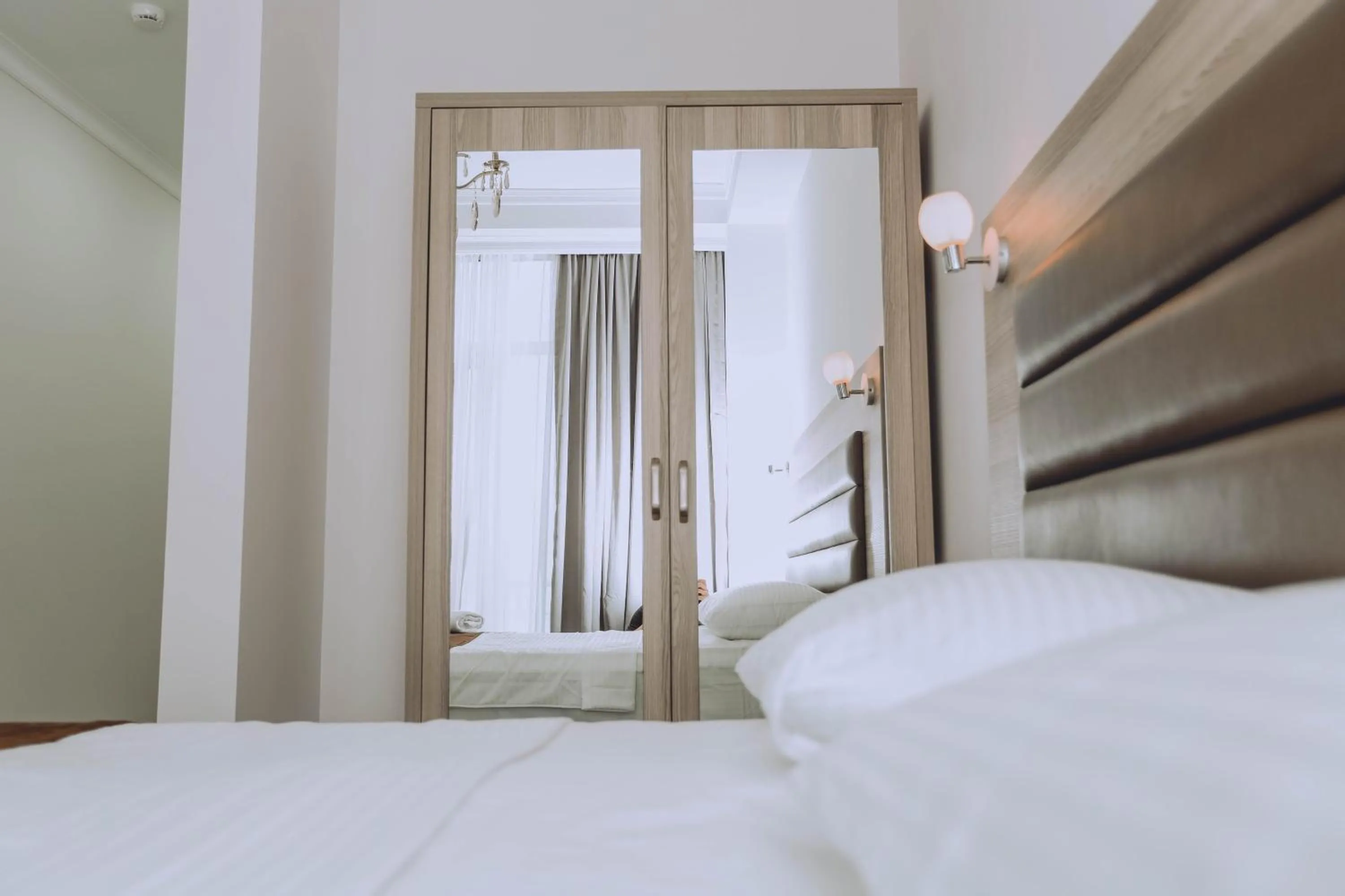 Bed in Royal Medis Hotel