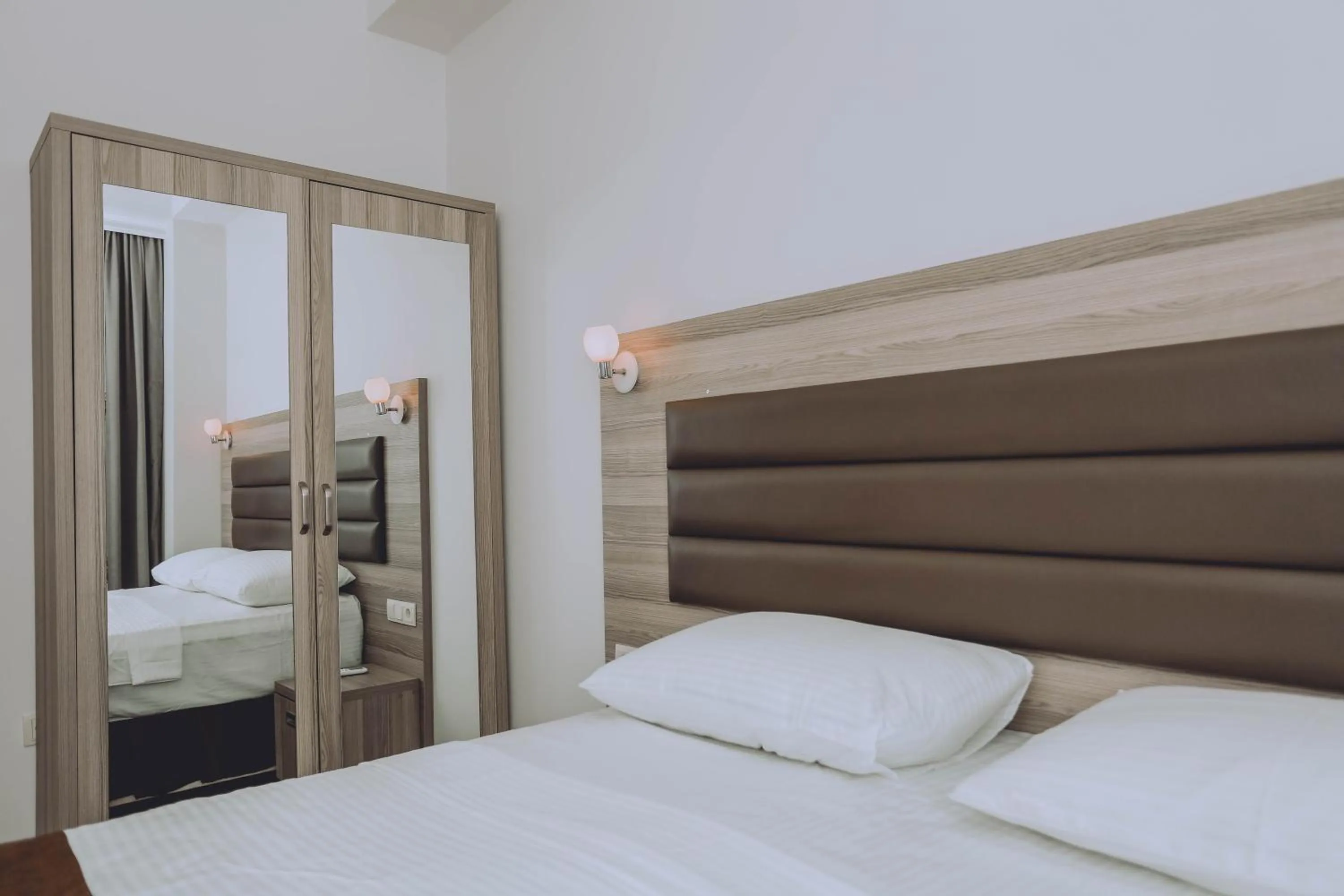 Bed in Royal Medis Hotel