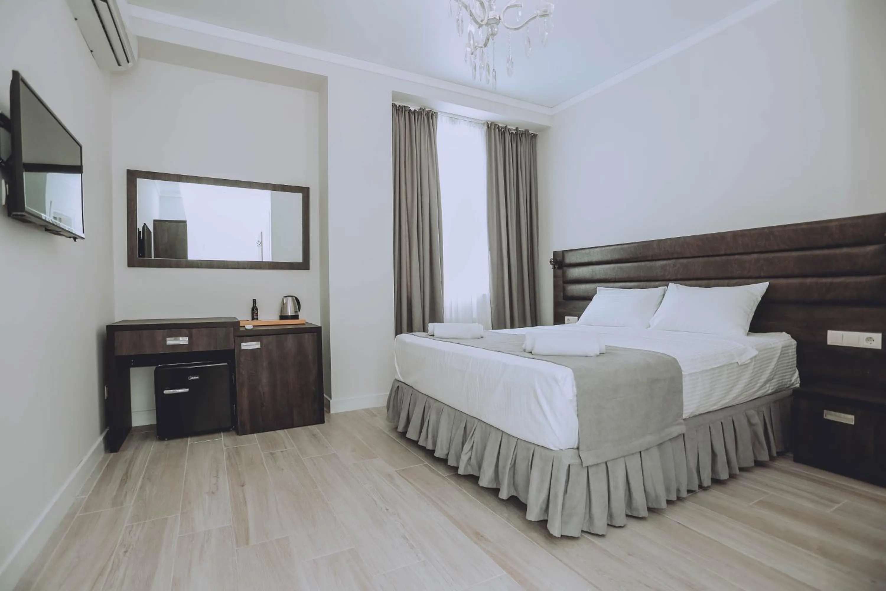 Bed in Royal Medis Hotel