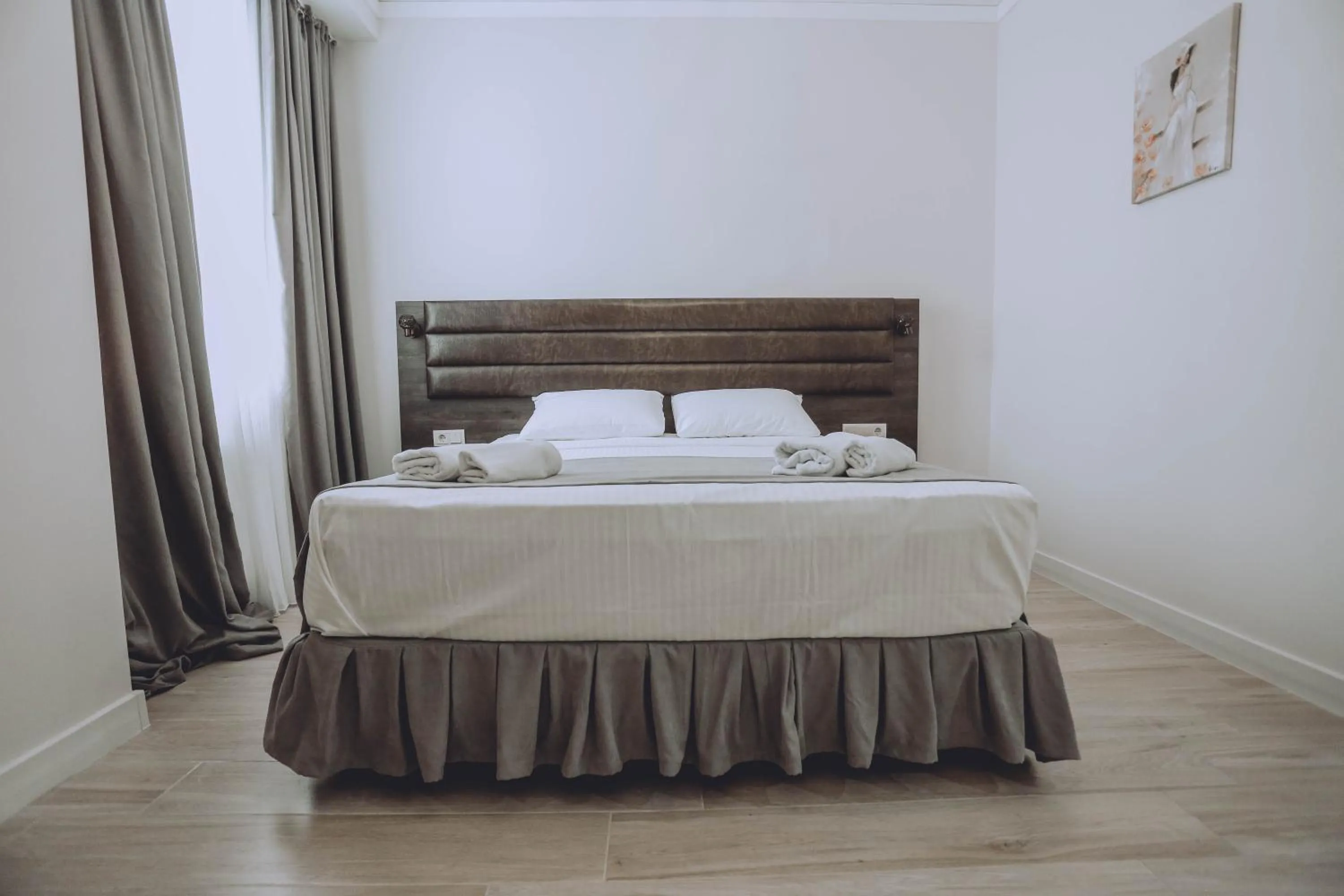 Bed in Royal Medis Hotel