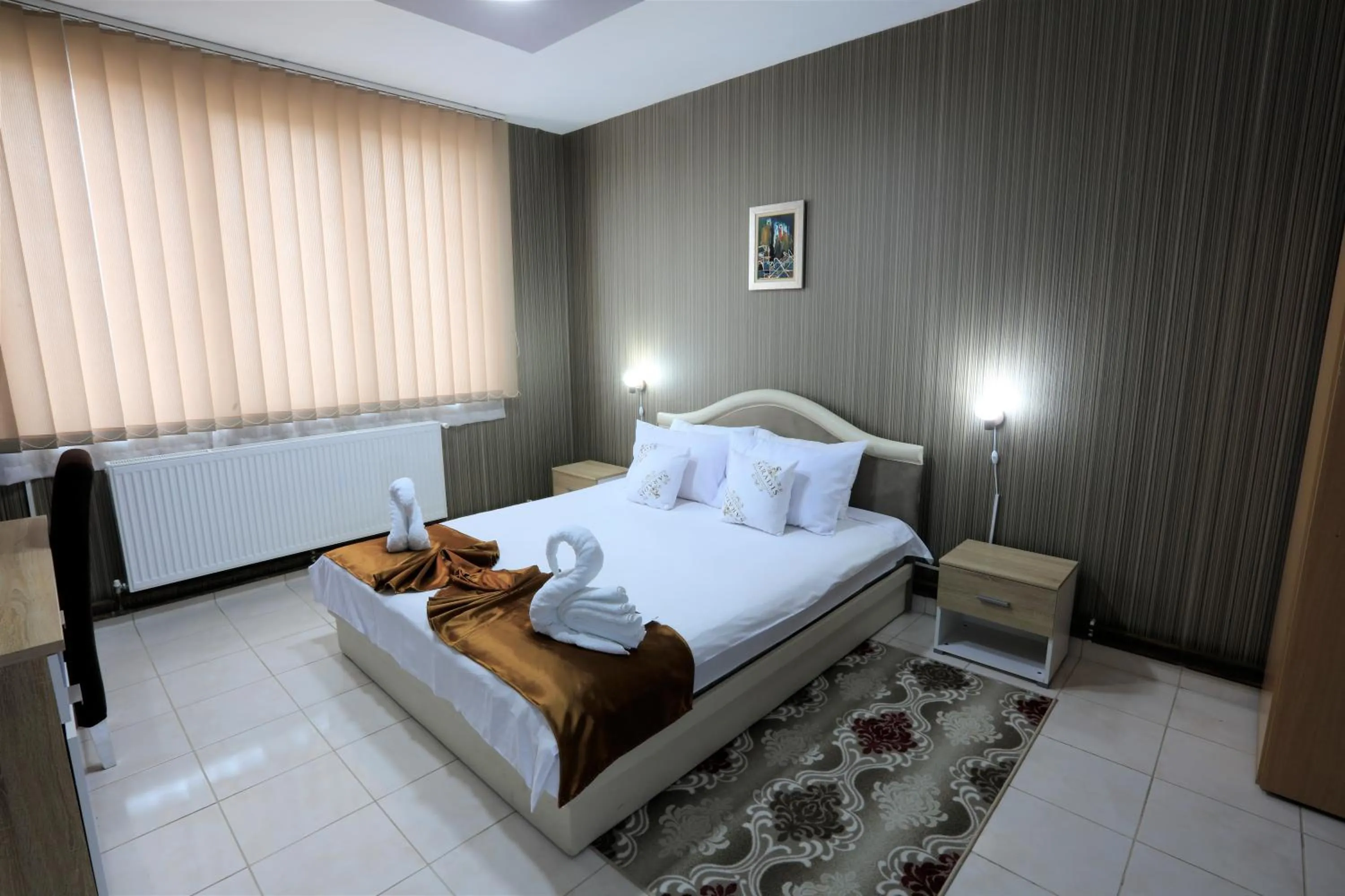 Bed in Hotel Saradis