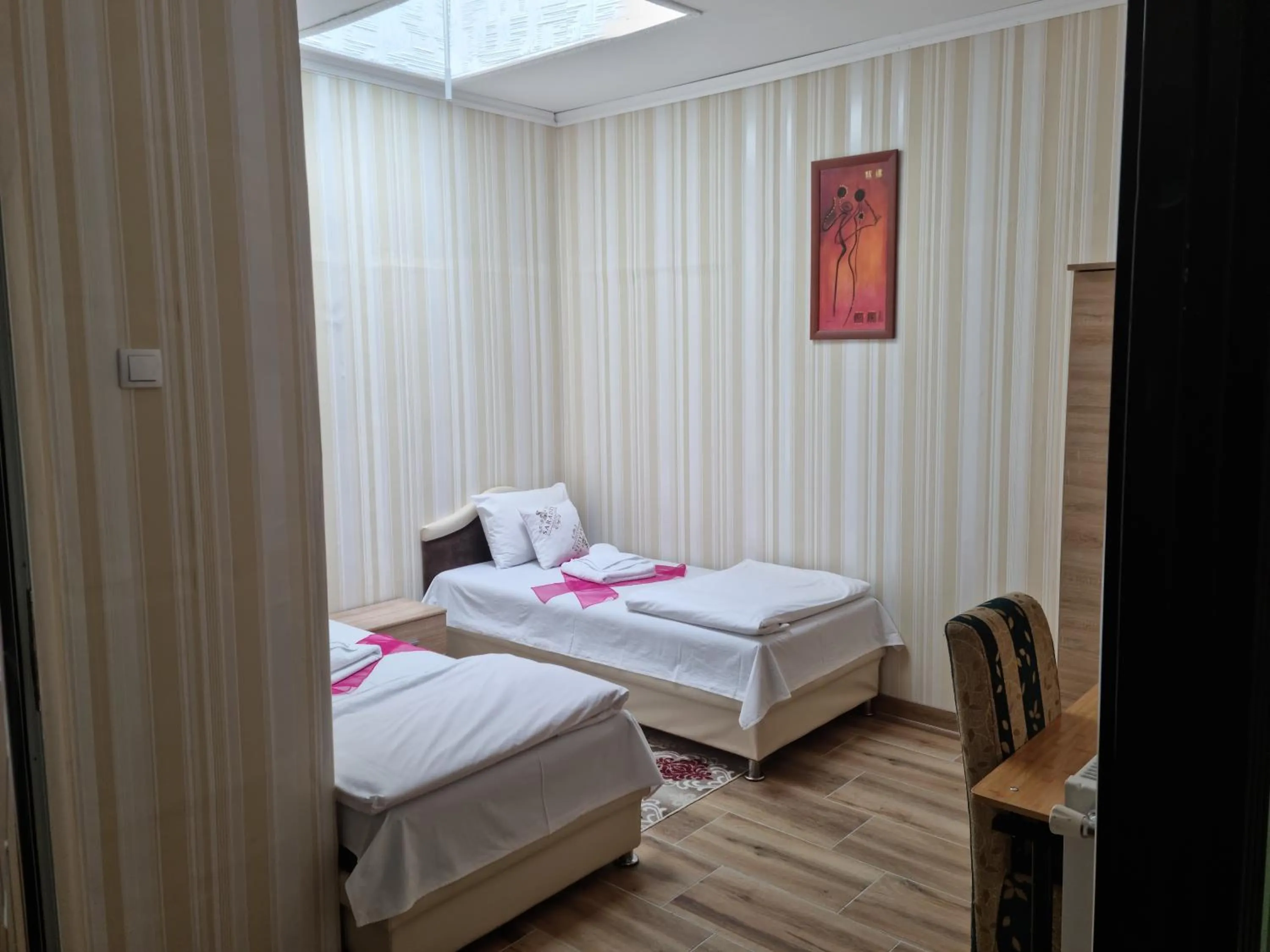 Bed in Hotel Saradis