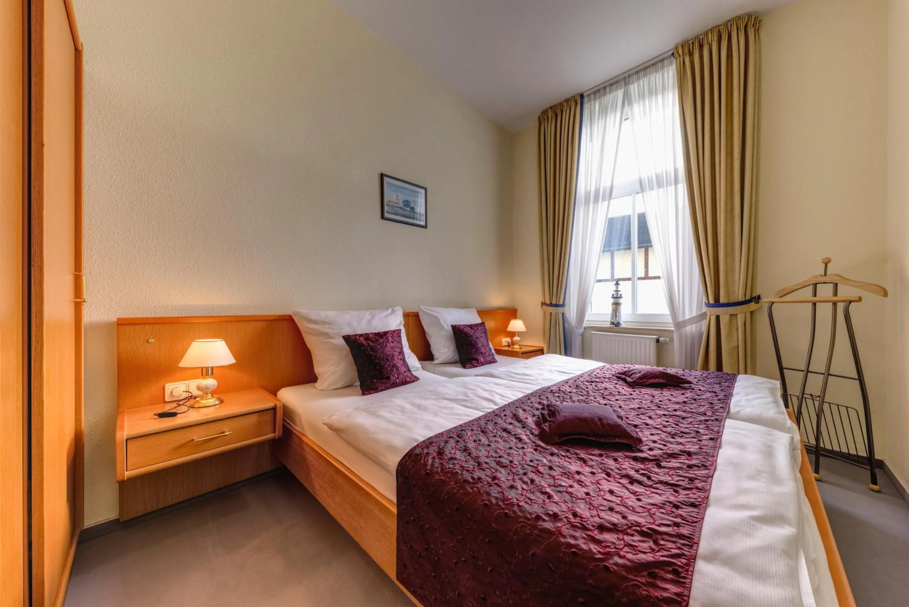 Bed in Hotel Aquamarin