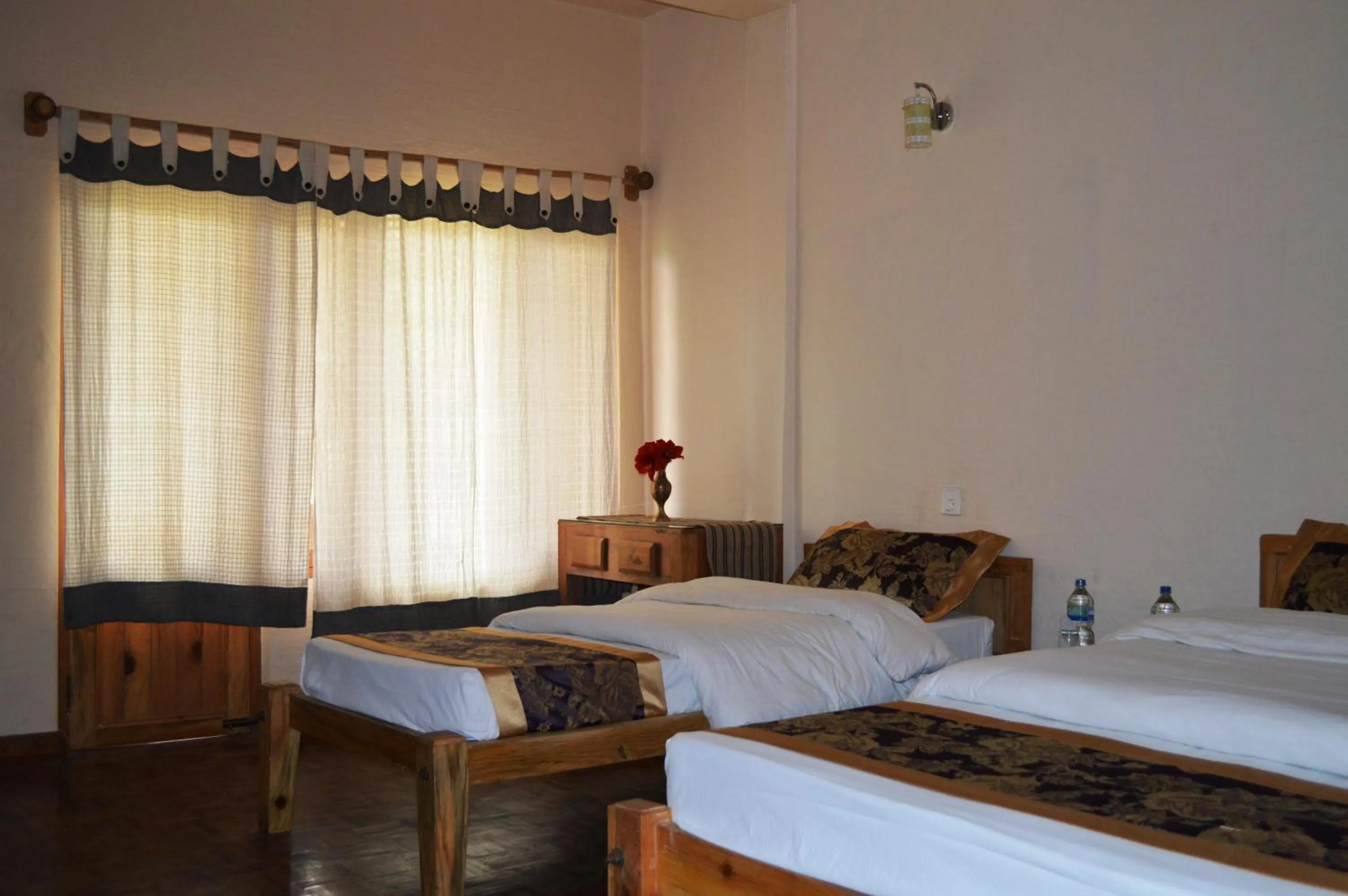 Bedroom, Bed in Chitwan Paradise Hotel