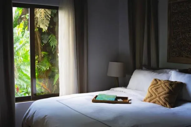 Bed in Chitwan Paradise Hotel