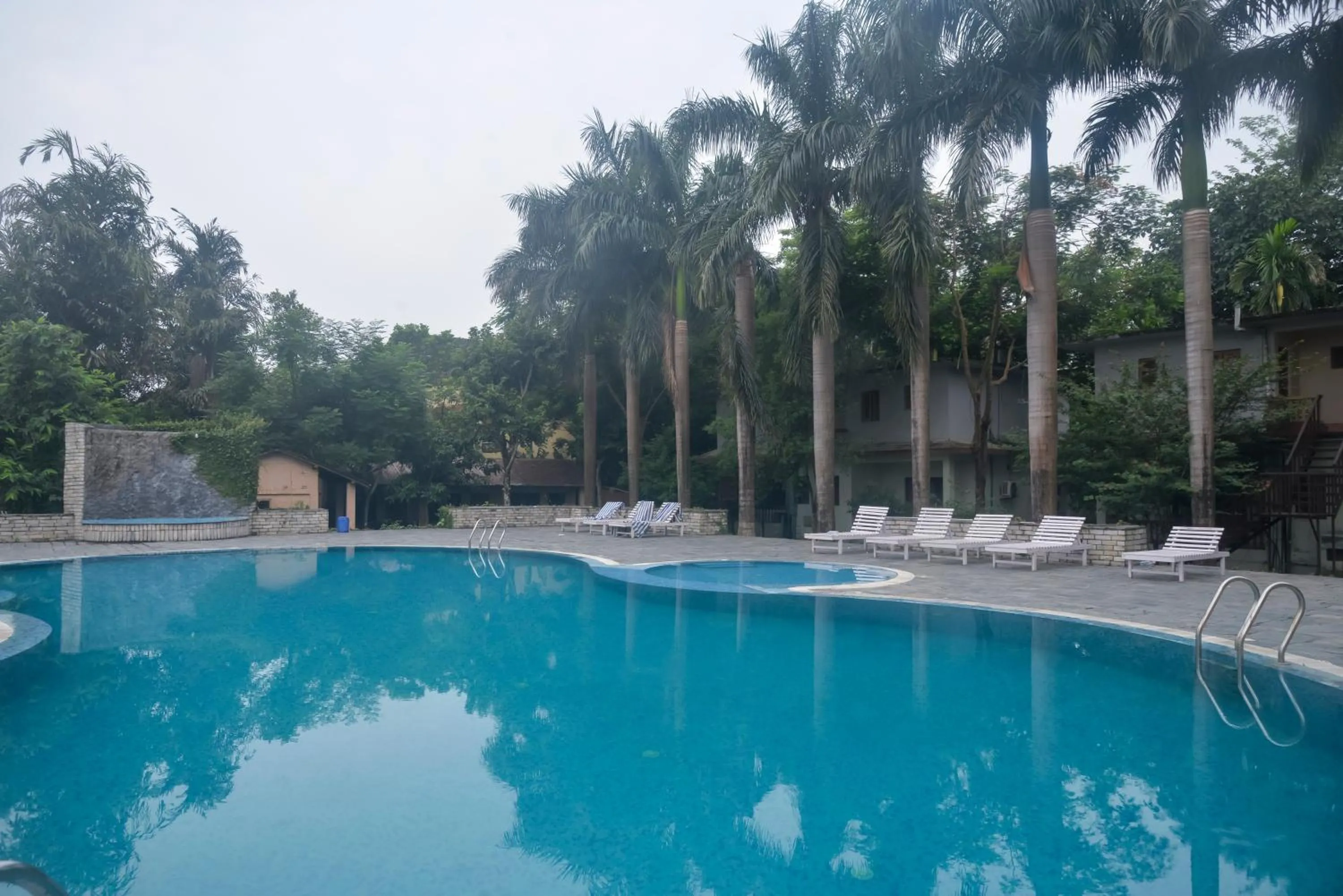 Swimming pool in Chitwan Paradise Hotel