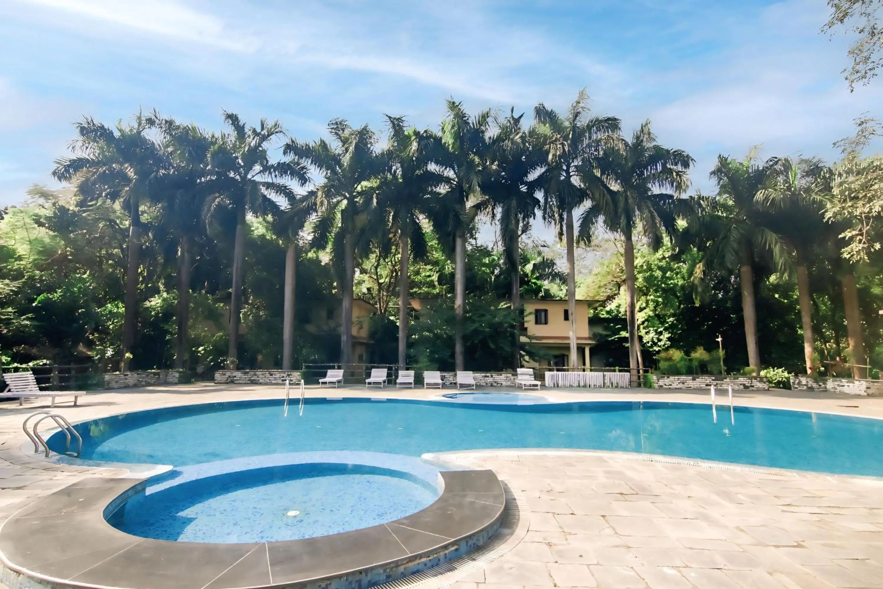 Swimming pool in Chitwan Paradise Hotel