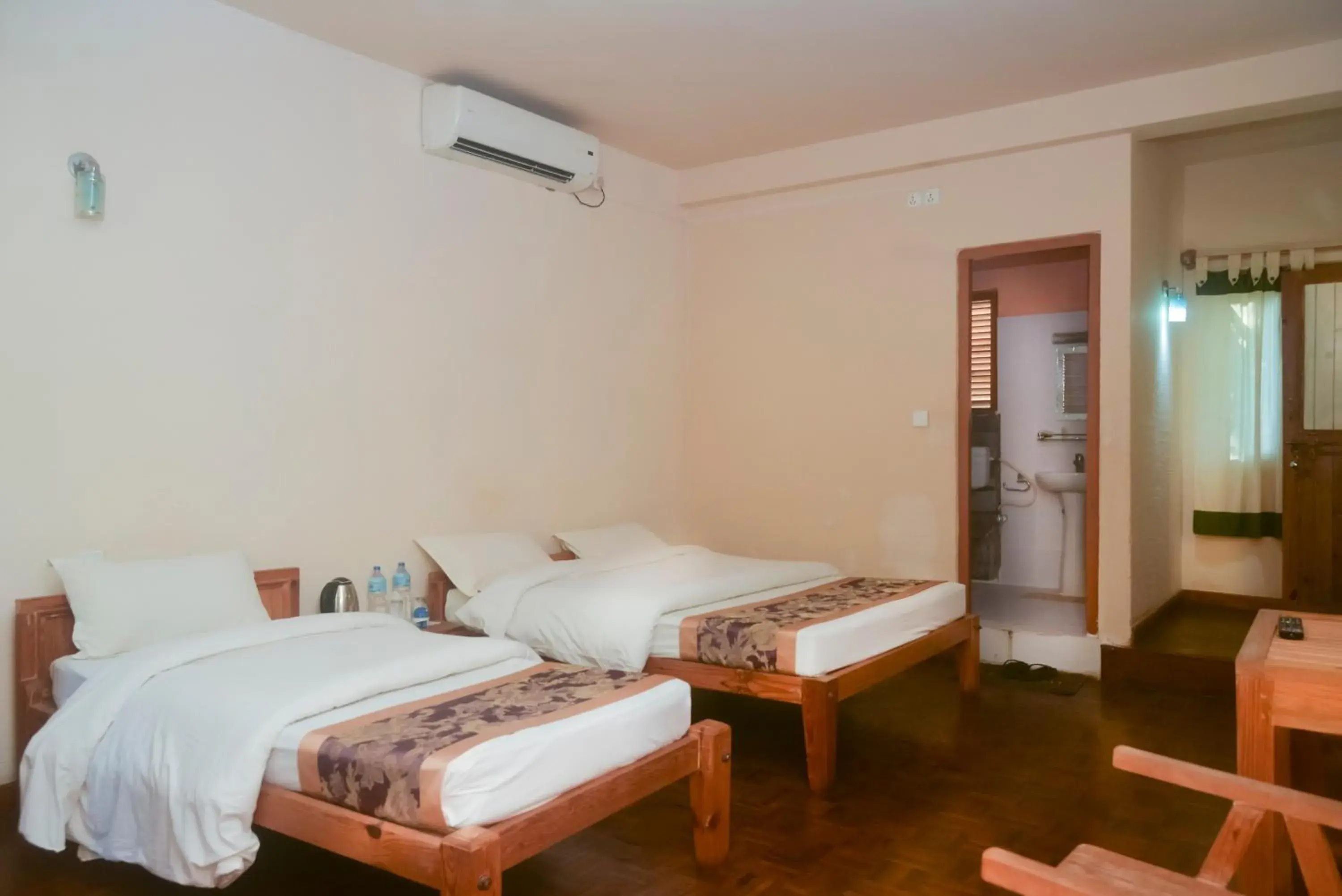 Deluxe Triple Room in Chitwan Paradise Hotel Deluxe Triple Room in Chitwan Paradise Hotel