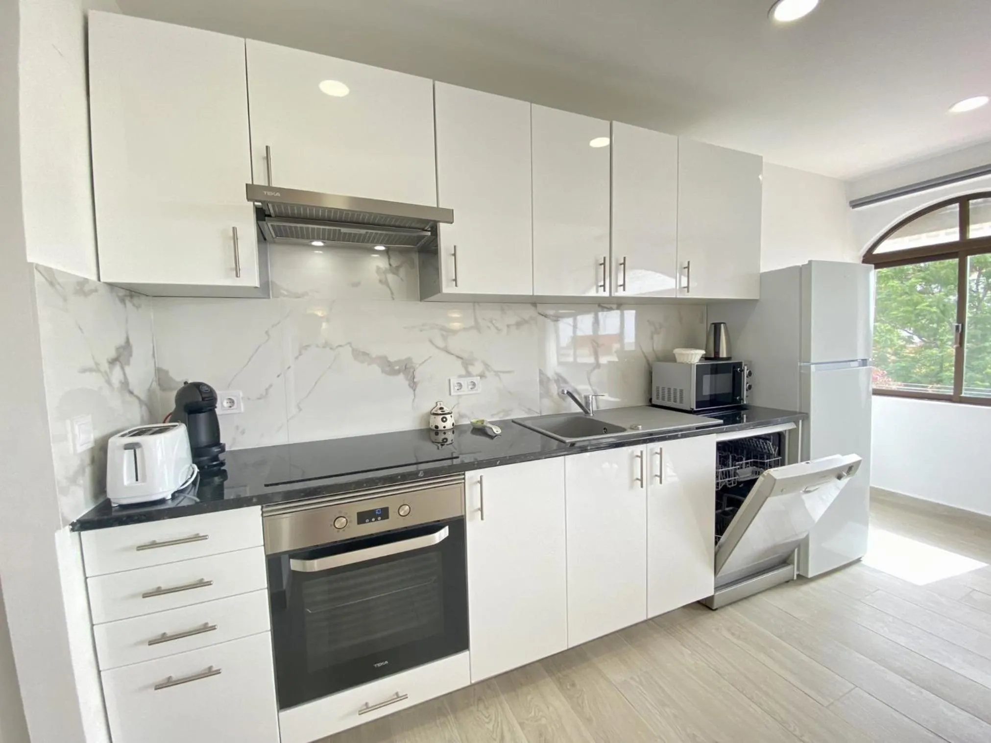 Kitchen or kitchenette in Albufeira Central 6 by Homing