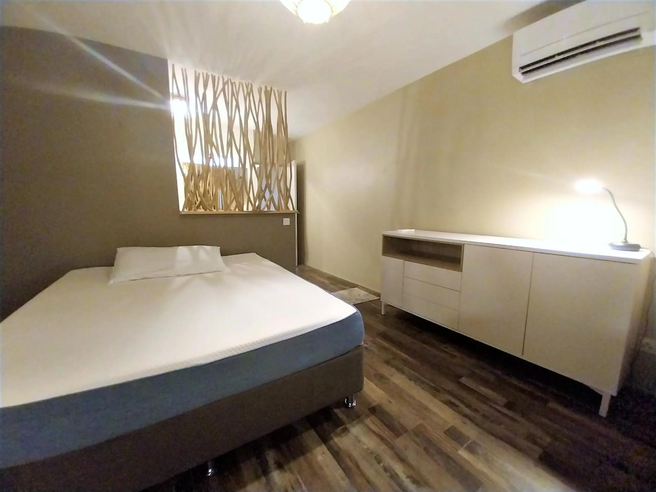 Bed in TAHITI - Urban Maohi Cottage