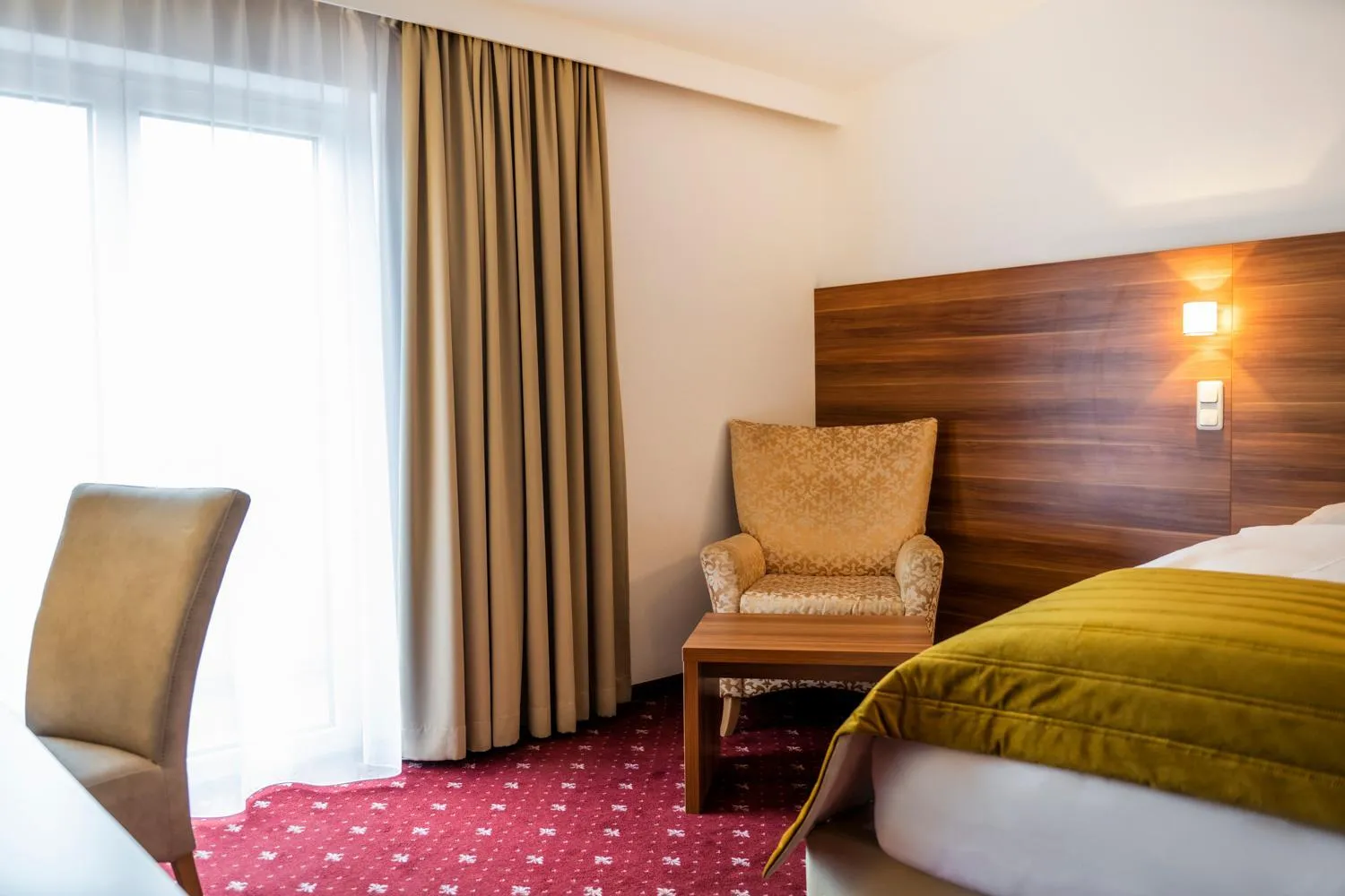 Seating area, Bed in Hotel Landskron