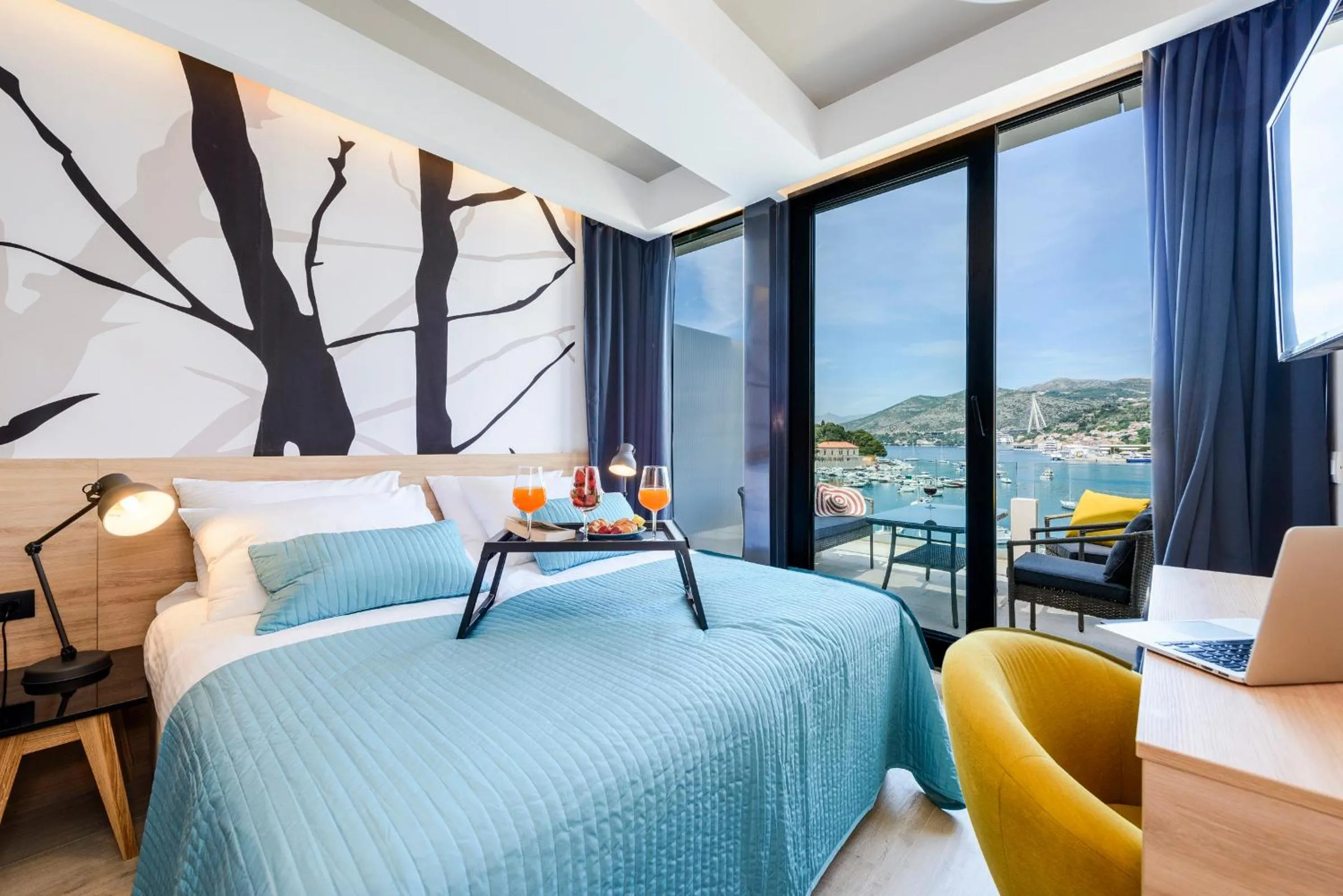 Bed in Adriatic Deluxe Apartments
