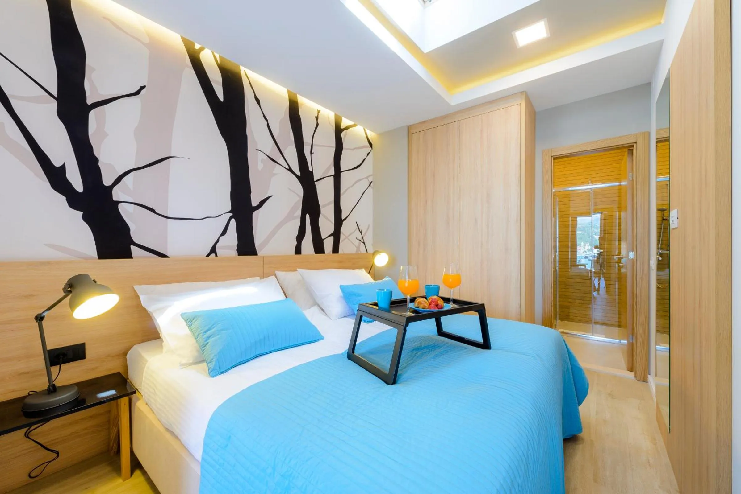Bed in Adriatic Deluxe Apartments