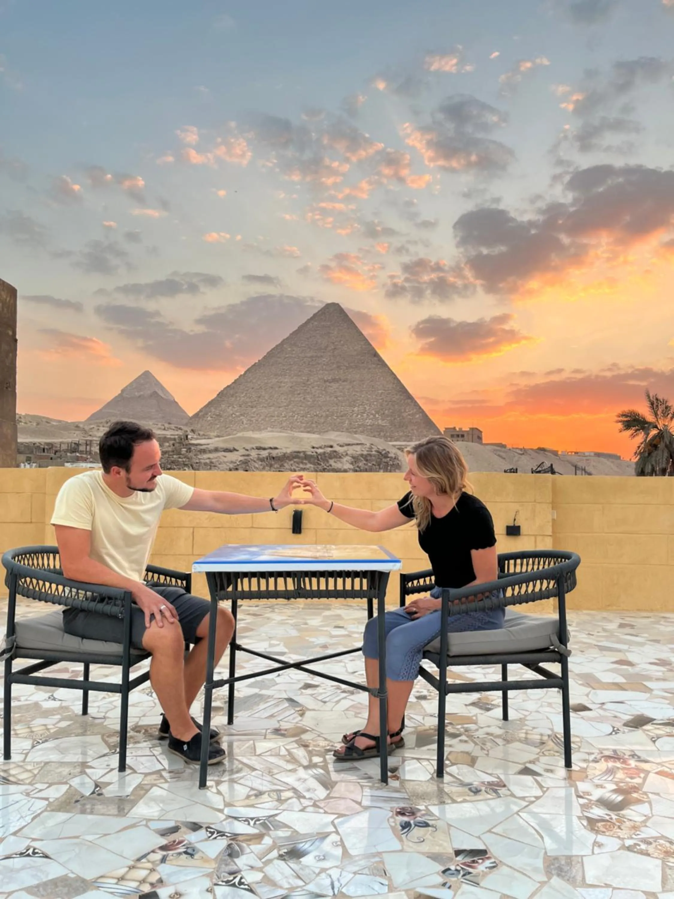 Sunset in El Khalil Pyramids View Inn