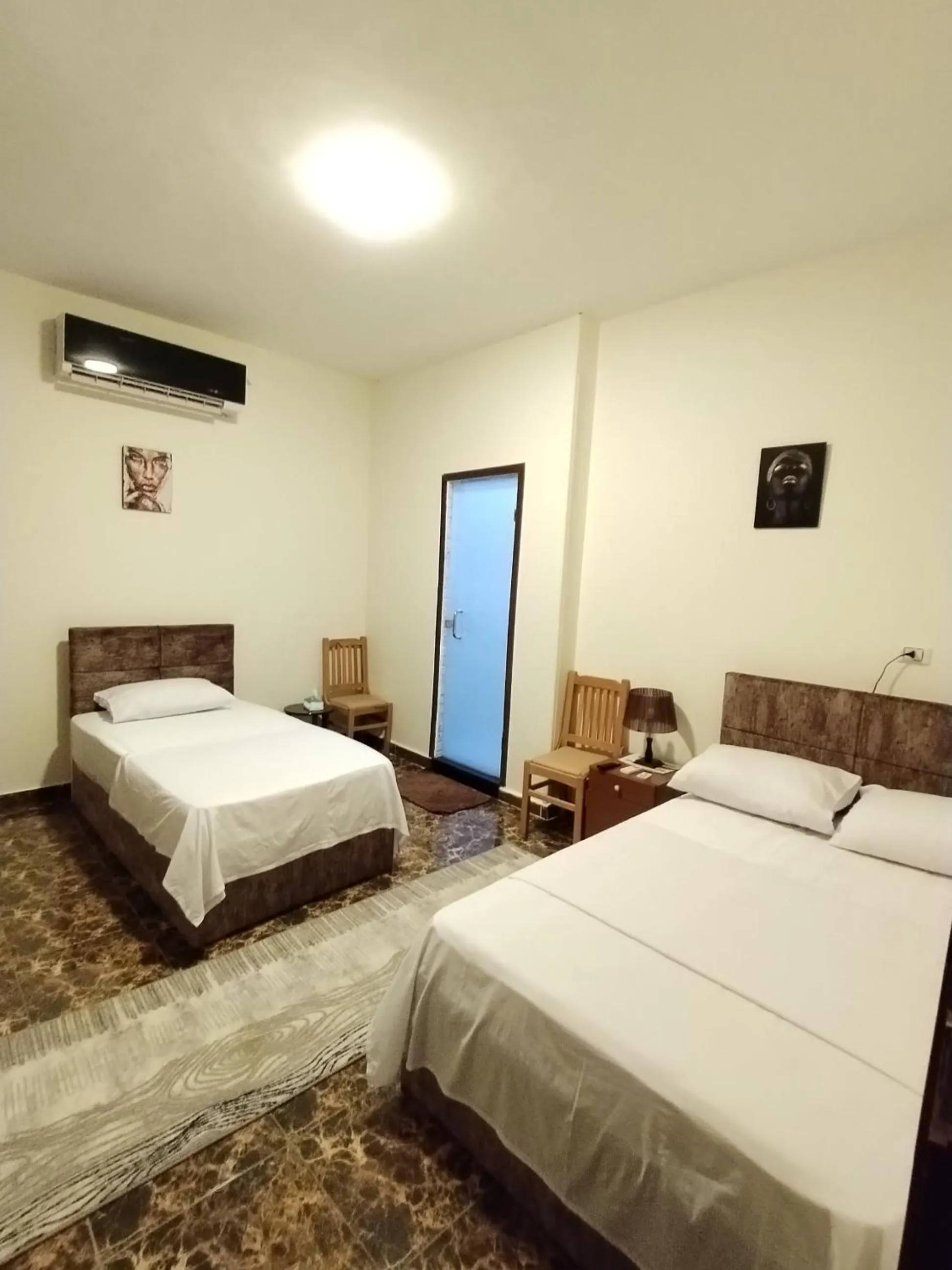 Photo of the whole room, Bed in El Khalil Pyramids View Inn