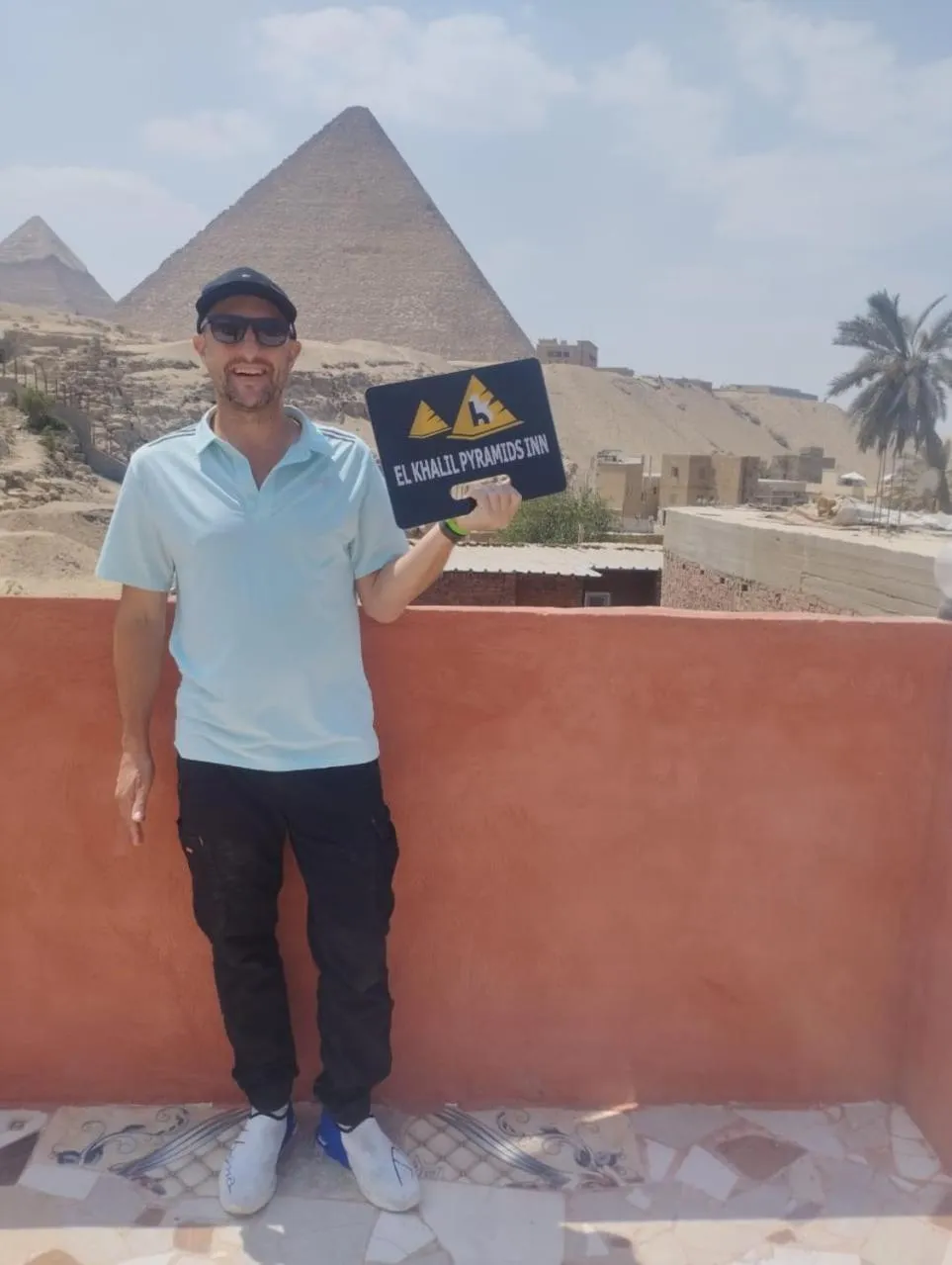 People in El Khalil Pyramids View Inn