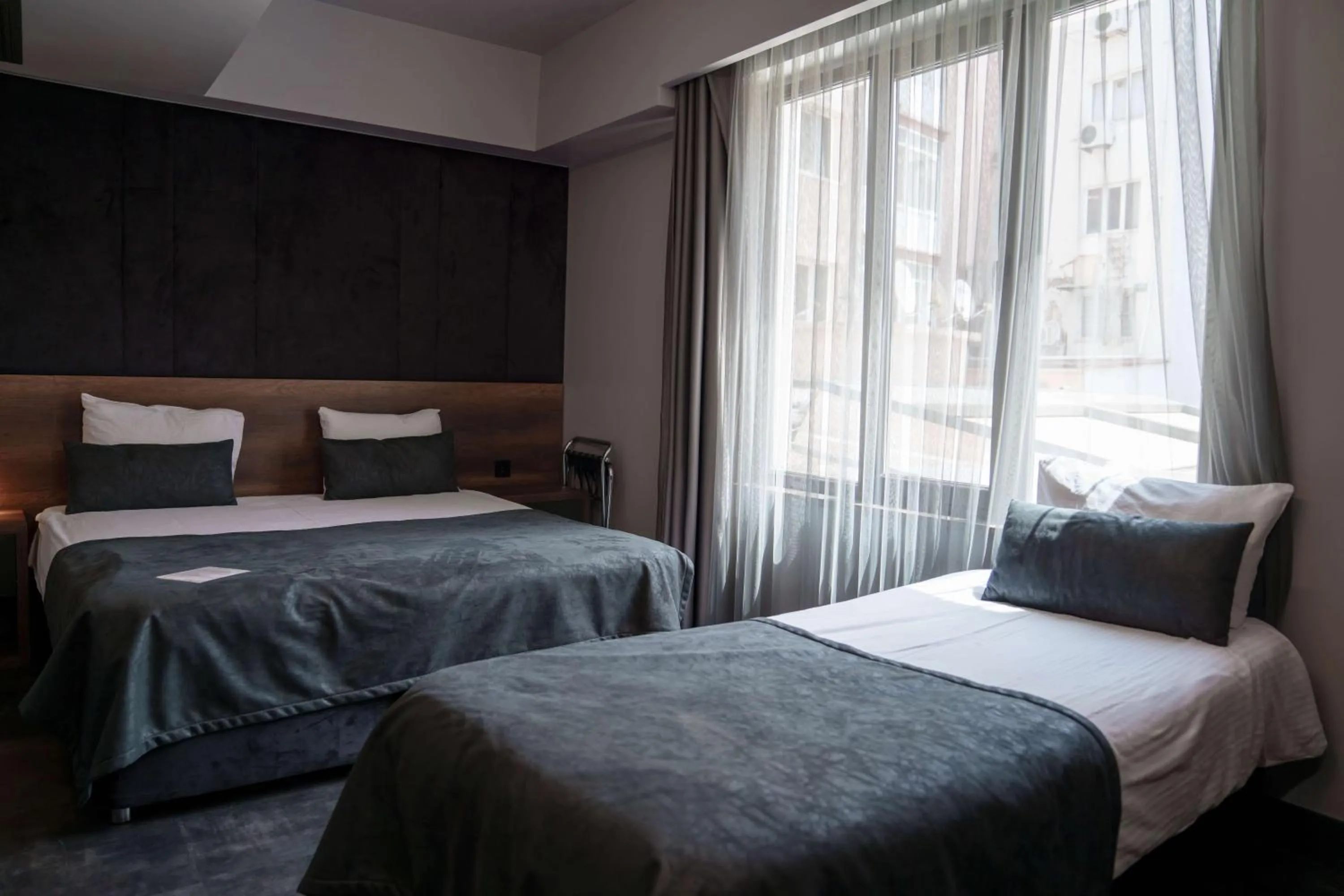 Bed in SennaCity Hotel