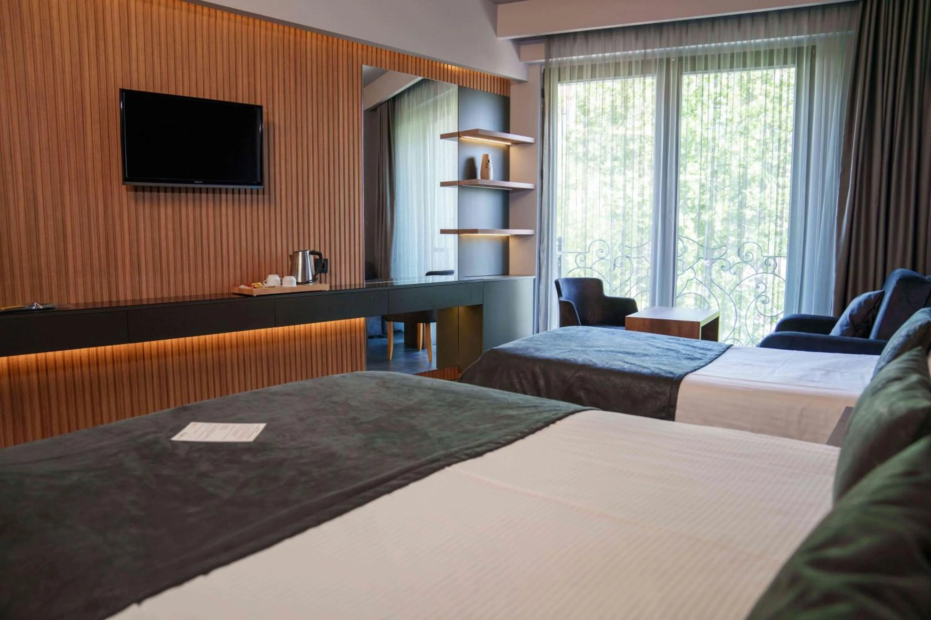 Bed in SennaCity Hotel