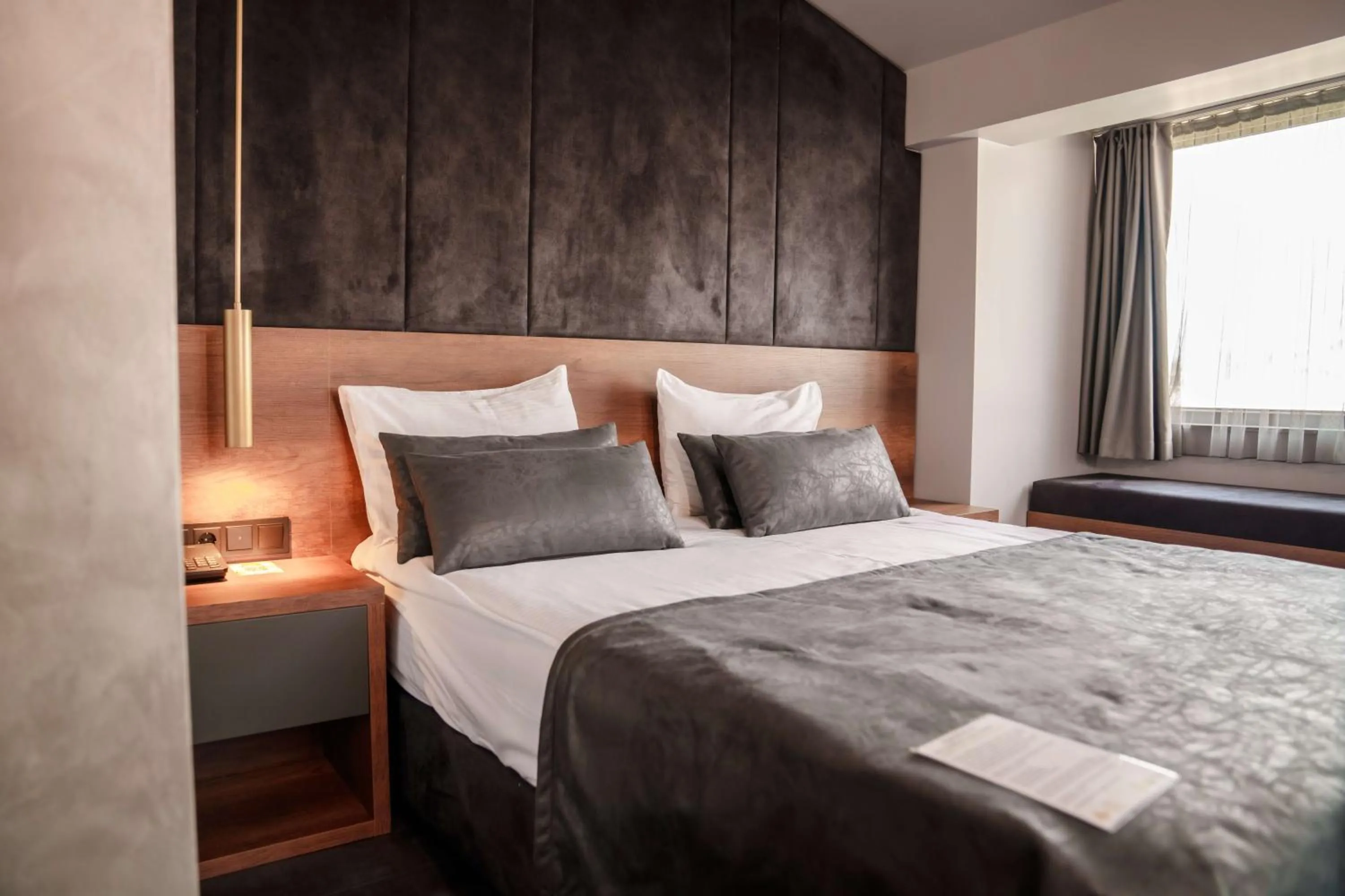 Bed in SennaCity Hotel