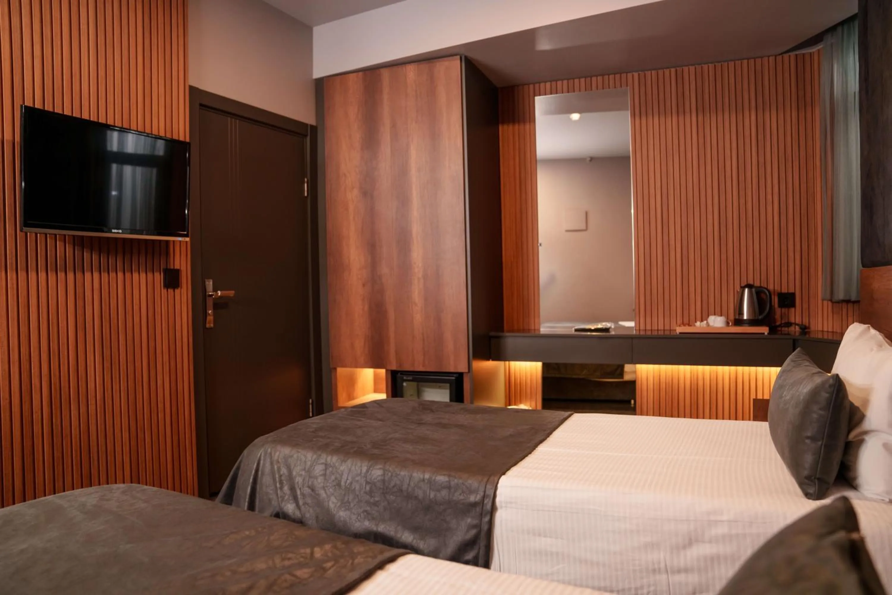 Bed in SennaCity Hotel