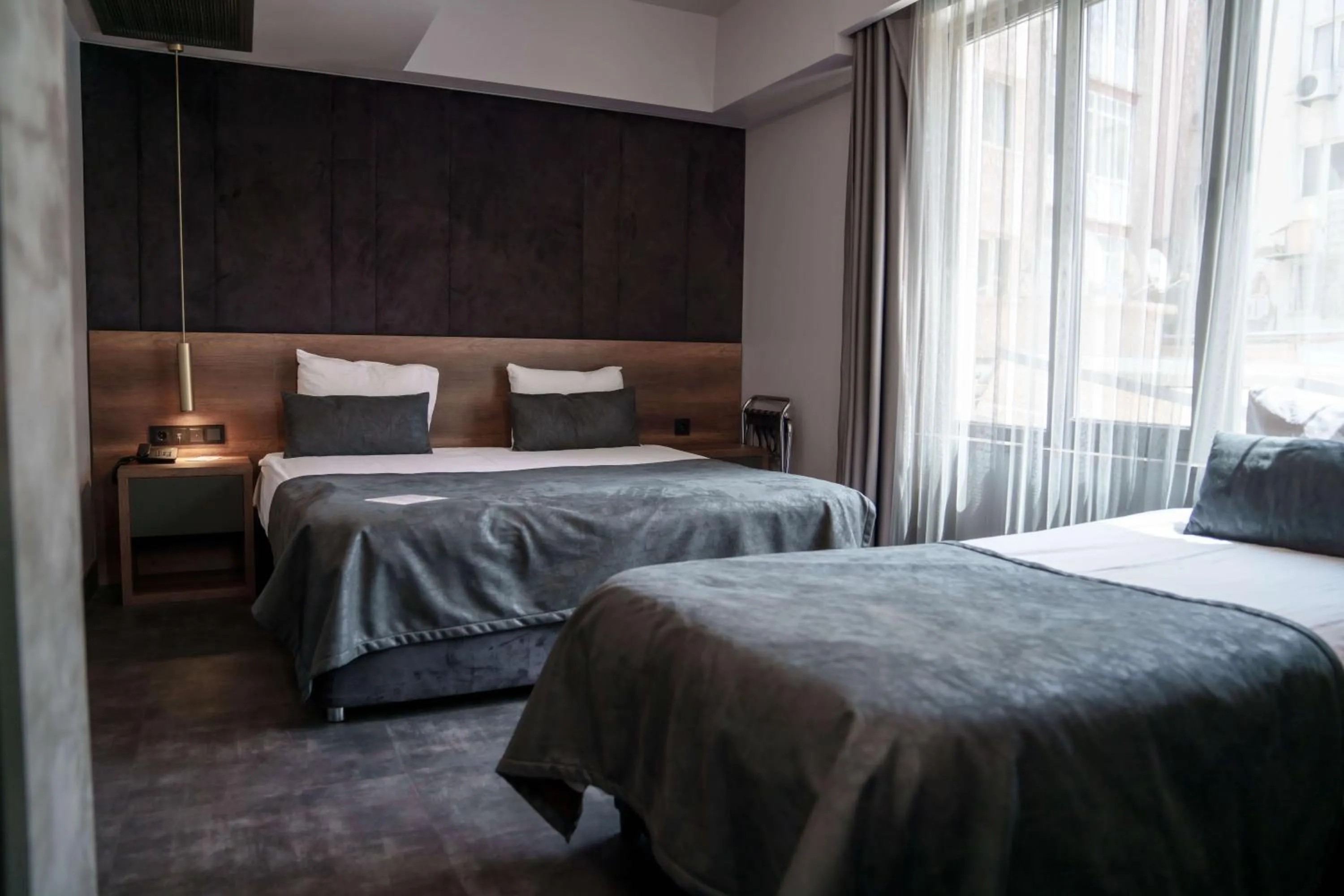 Bed in SennaCity Hotel