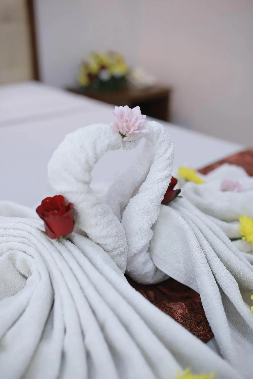 Bed in WISMA KUSUMA HOTEL