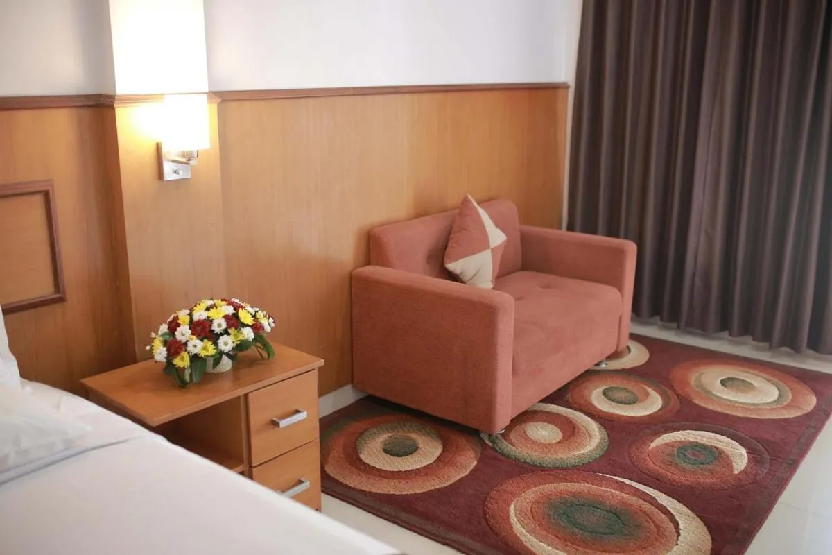 Bed in WISMA KUSUMA HOTEL