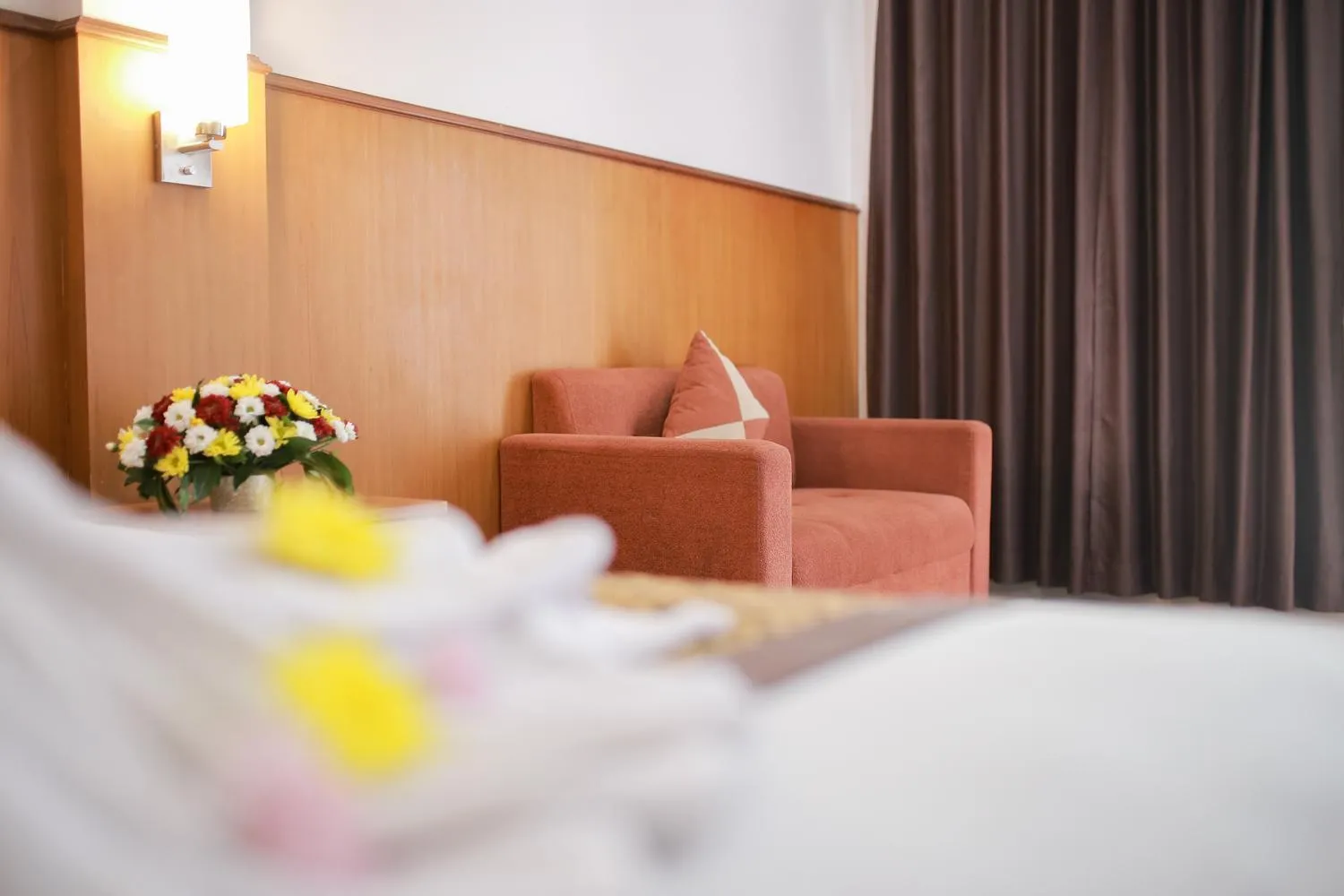 Bed in WISMA KUSUMA HOTEL